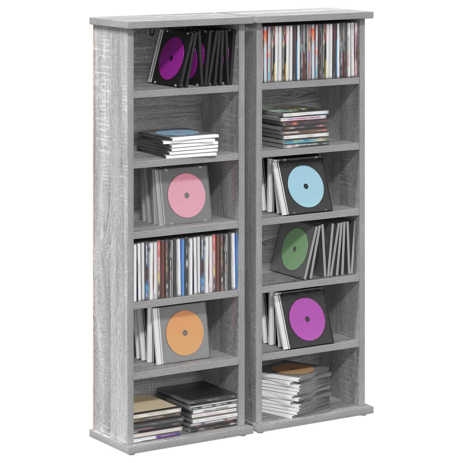 Grauer zweigeteilter CD- und Plattenlagerschrank gefüllt mit Schallplatten und Stapeln von CDs auf mehreren Regalen.