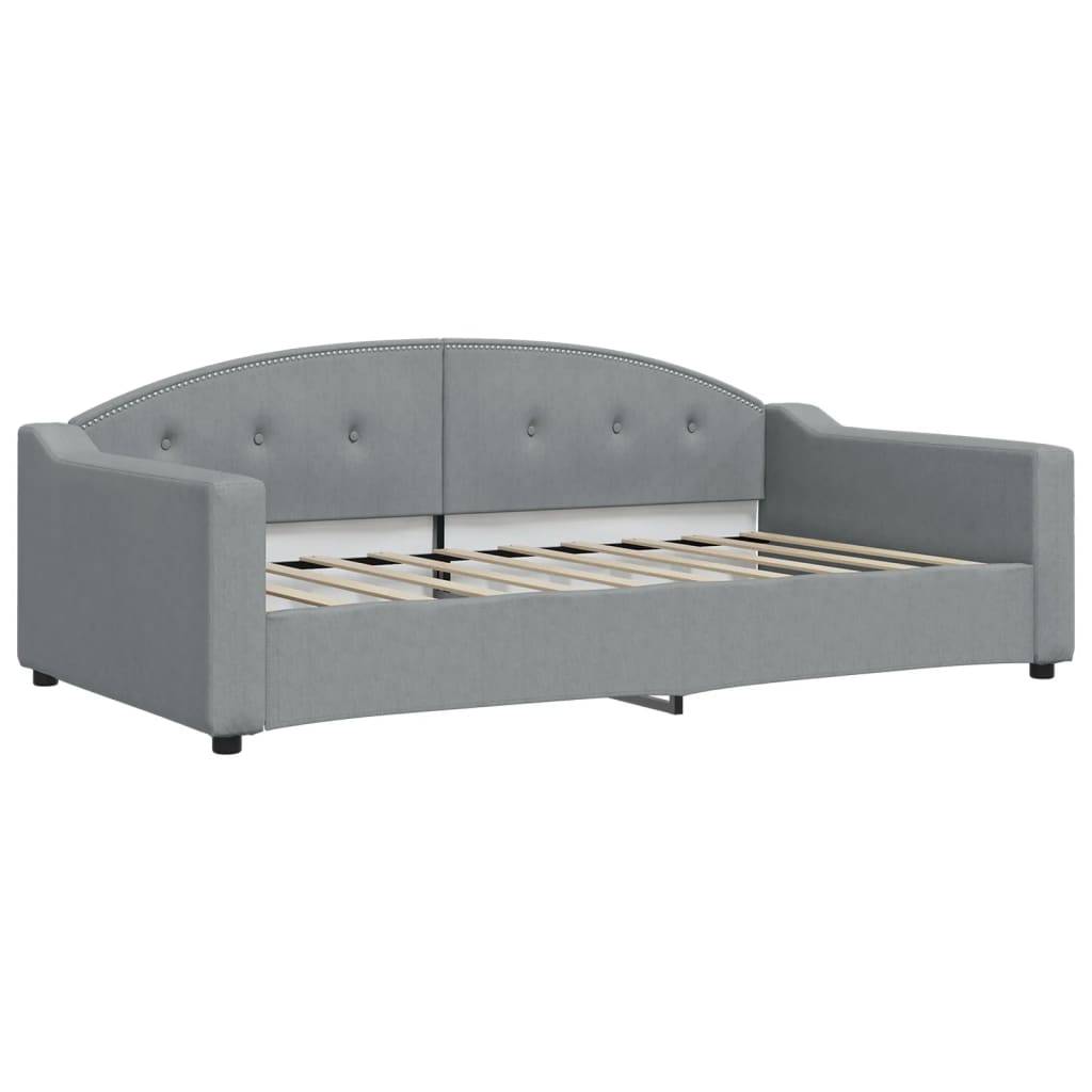 Grau gepolstertes Schlafsofa mit gewölbter, knopfgesteppter Rückenlehne und Holzlatten, dargestellt vor weißem Hintergrund.