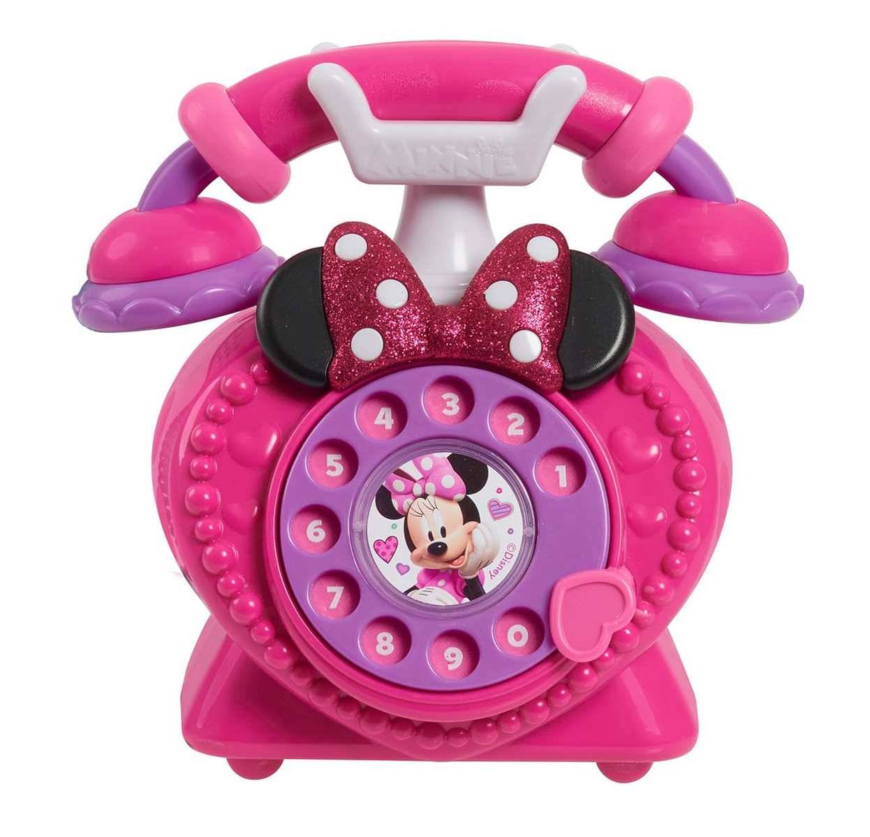 Rosa Minnie-Maus-Spielzeugtelefon mit Wählscheiben-Zahlentasten und schleifenförmigem Hörer.