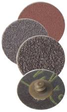Vier übereinander gestapelte kreisförmige Schleifscheiben, wobei die vordere Scheibe ein zentrales Befestigungsloch und eine Schleifplatte zeigt.