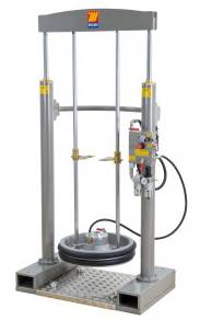 Industrielle Hydraulikprüfmaschine mit vertikalem Rahmen, hängender Kreisplattform und Steuereinheit auf der rechten Seite.