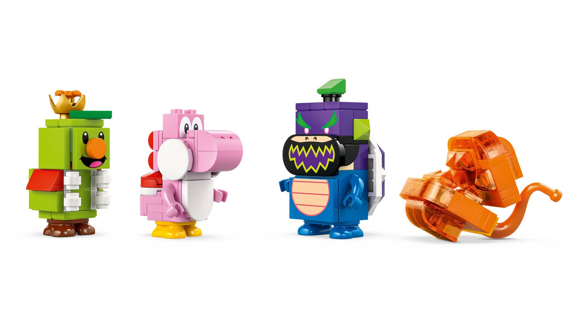 Vier farbenfrohe Spielzeugtierroboter in einer Reihe: grüner Vogel, rosa Elefant, dunsteres Monster mit breitem Maul und orangefarbener Affe.