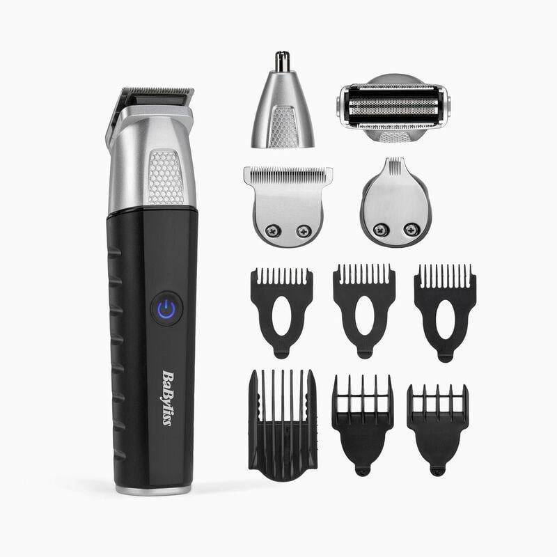 Haarschneider-Set mit schnurlosen schwarz-silbernen Trimmer, drei Schneidekopfköpfen und mehreren Haarschneider-Aufsätzen auf weißem Hintergrund.