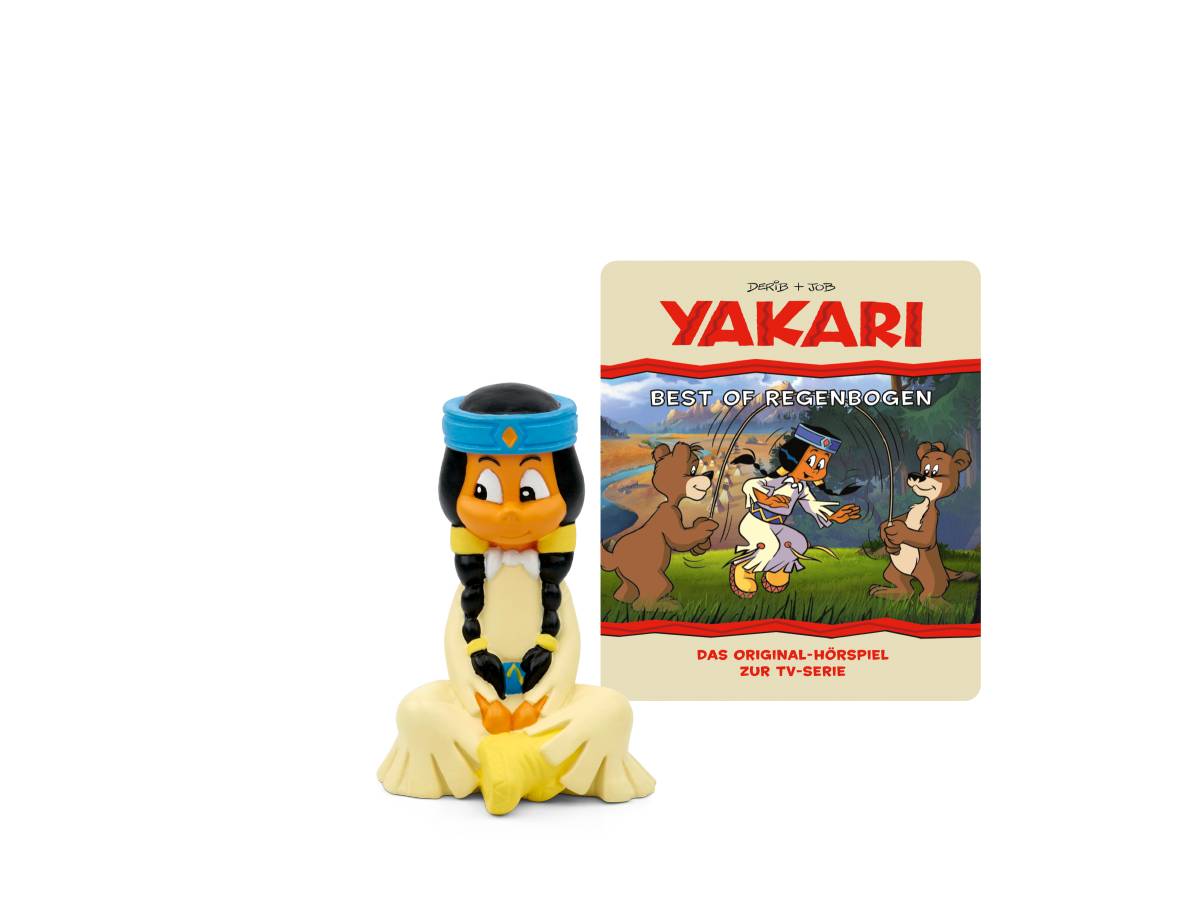 Yakari 'Best of Regenbogen' Cover-Art neben einer Yakari-Figur mit blauem Kopfschmuck auf schwarzem Hintergrund.