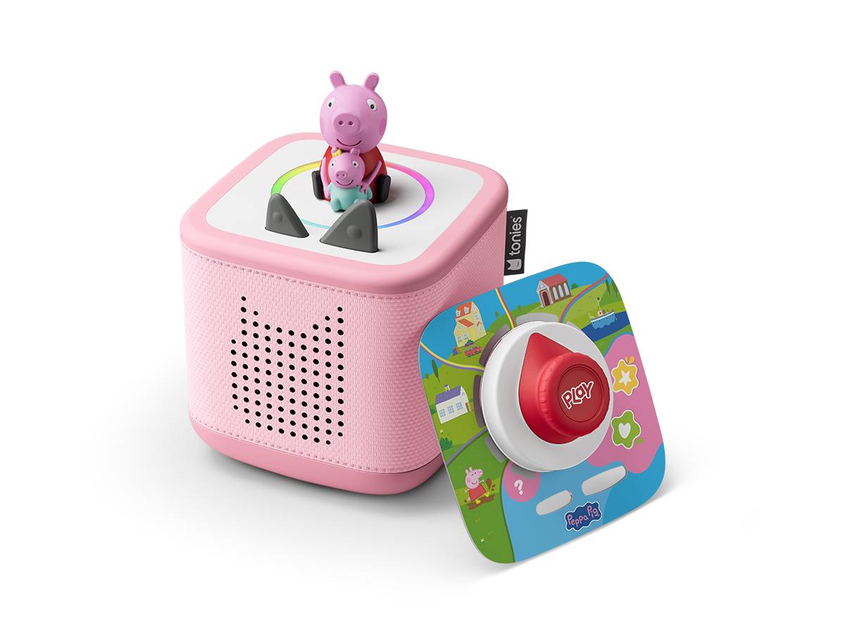 Rosa Kinder-Audioplayer mit einer Peppa-Wutz-Figur auf der Oberseite und einer bunten abnehmbaren Frontplatte mit einem großen roten „Play