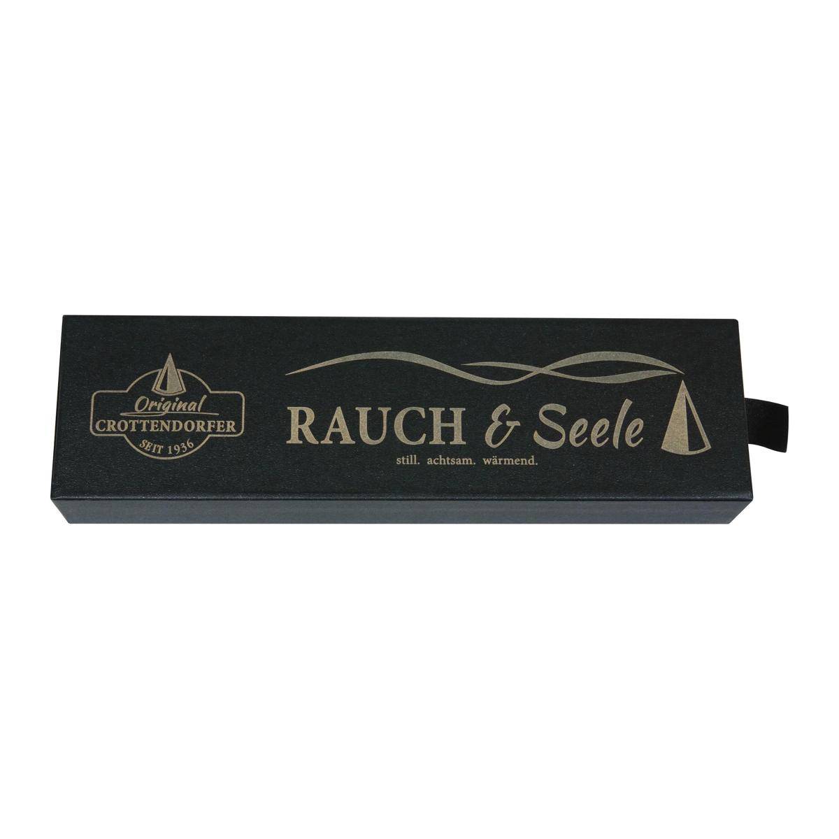 Schwarze rechteckige Geschenkbox mit goldenem 