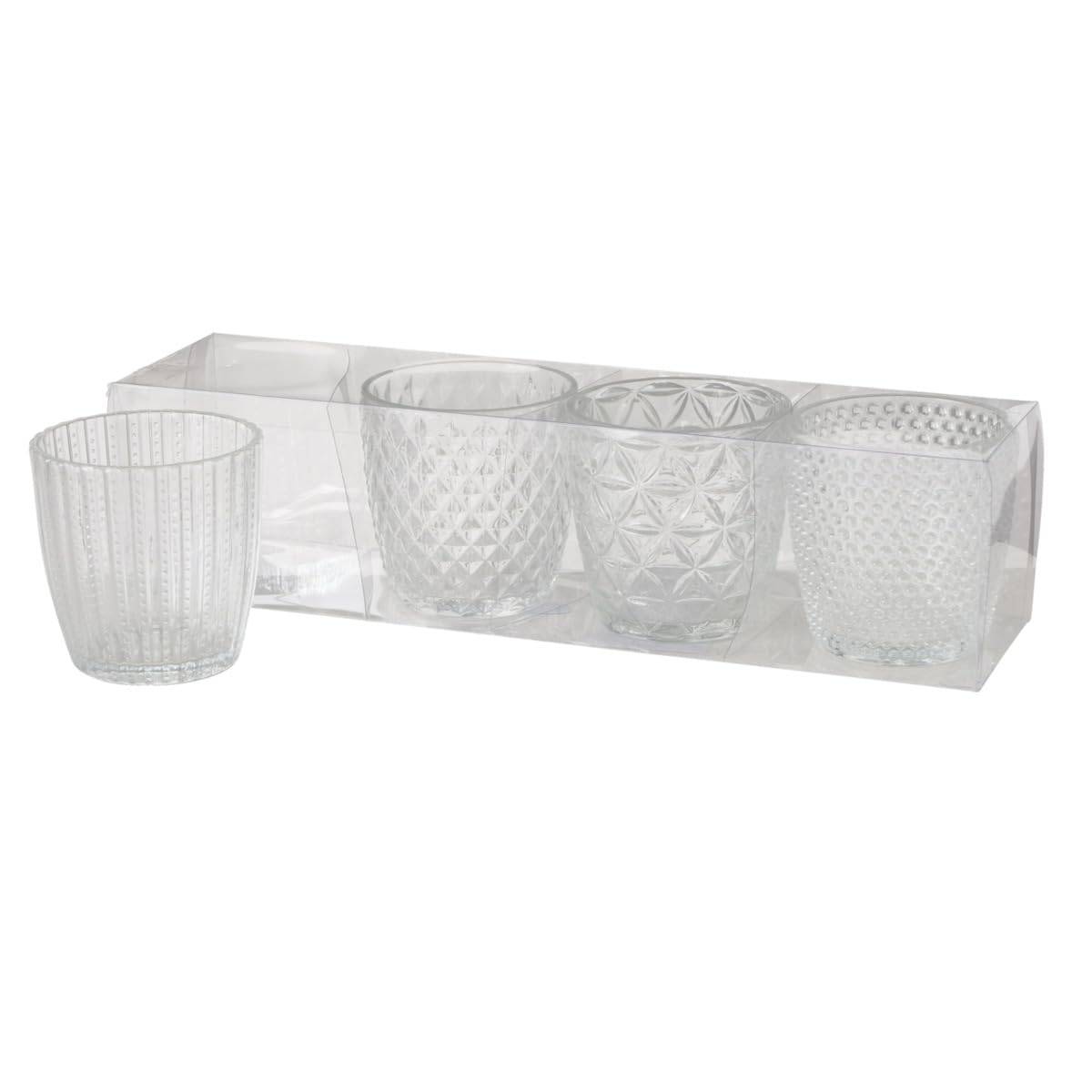 Set aus vier klaren strukturierten Glastumblern in einer transparenten Geschenkbox, mit einem Glas außerhalb der Verpackung gezeigt.
