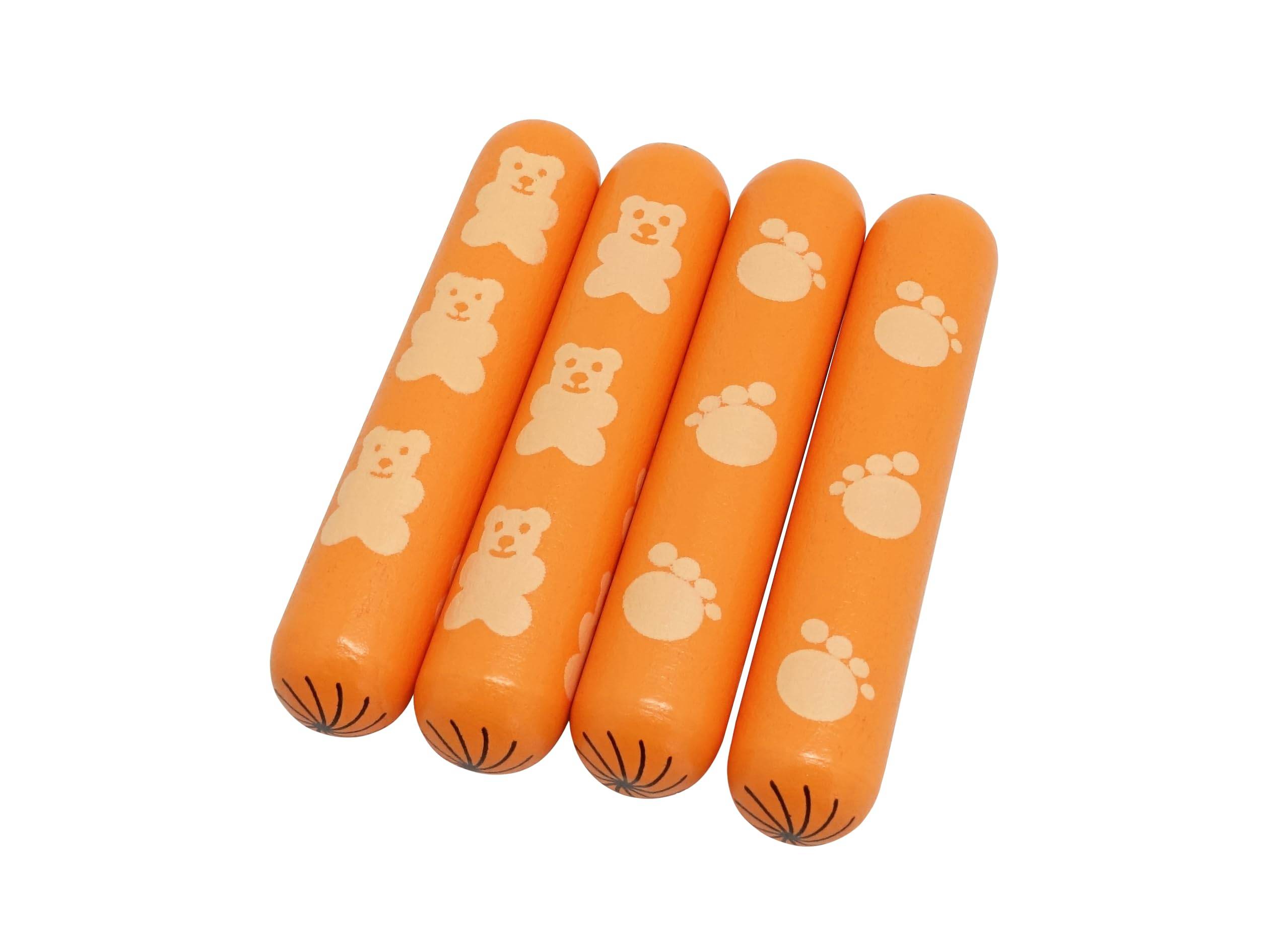 Vier orangefarbene ballonförmige Haustierspielzeuge mit weißen Bären- und Pfotenprinten, nebeneinander auf weißem Hintergrund angeordnet.