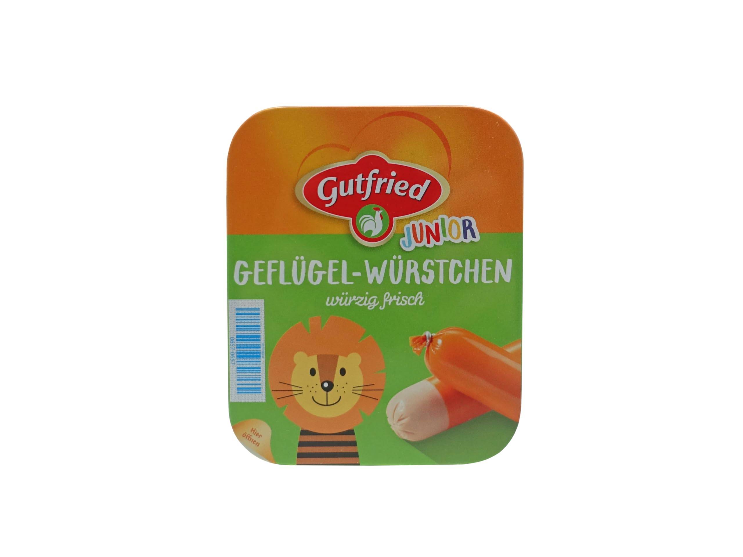 Gutfried Junior 'Geflügel-Würstchen' Geflügelwurst-Paket mit einem Cartoon-Löwen und Wurststücken auf einem grün-orangefarbenen Etikett.