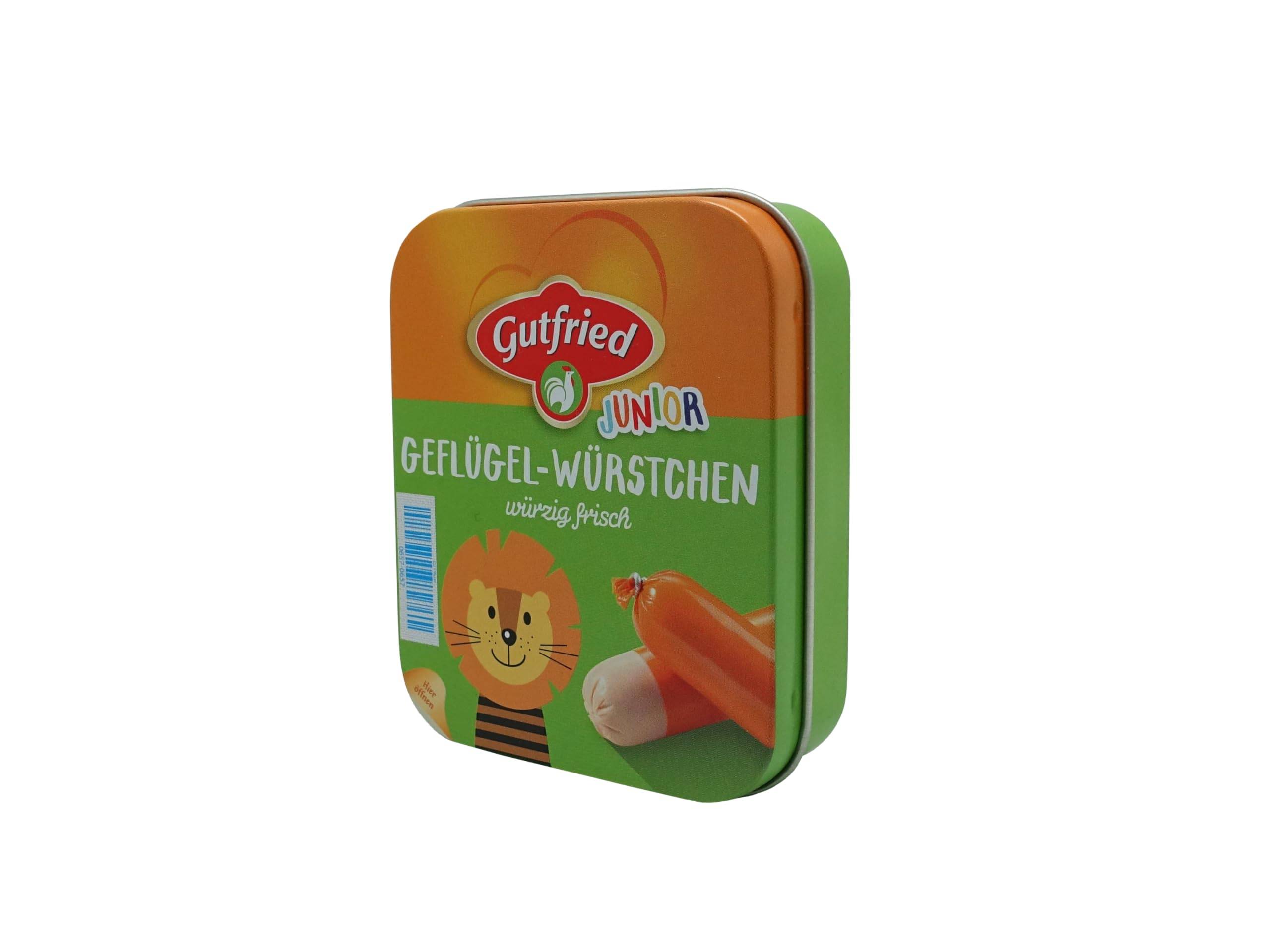Gutfried Junior Geflügel-Würstchen Packung, eine grün und orange Kinderdosen-Geflügelwurst mit einem Cartoon-Löwe und Wurstbild.