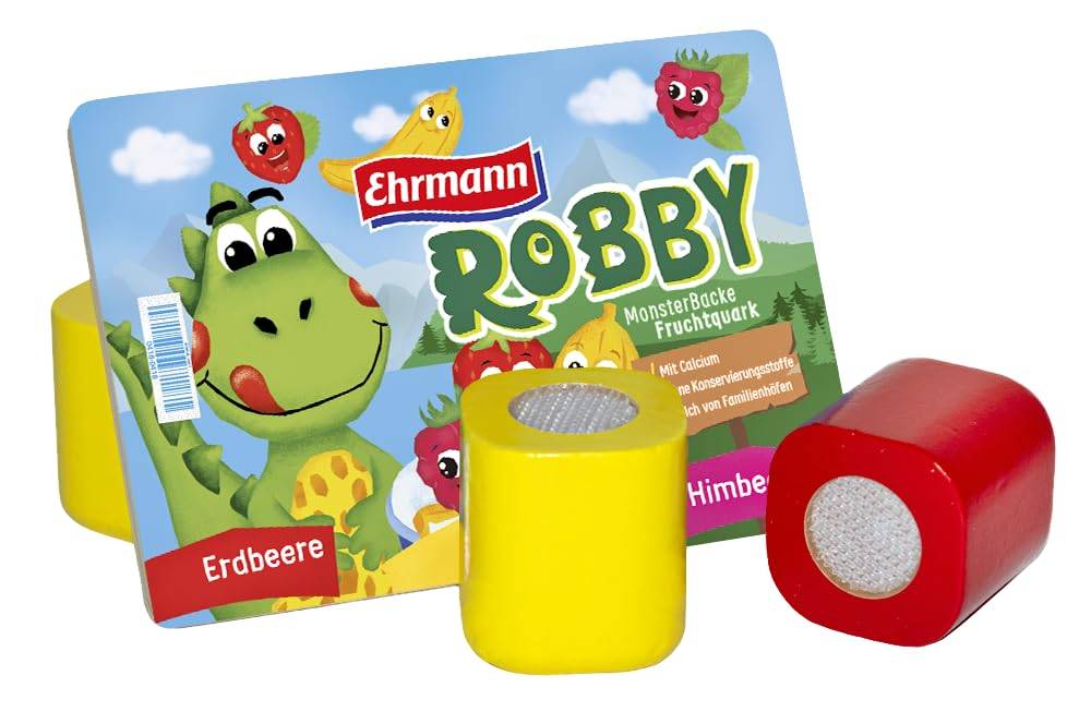 Ehrmann Robby Fruchtjoghurt-Verpackung mit Cartoon-Dinosaurier und Erdbeere, plus rote und gelbe Joghurtbecher davor.