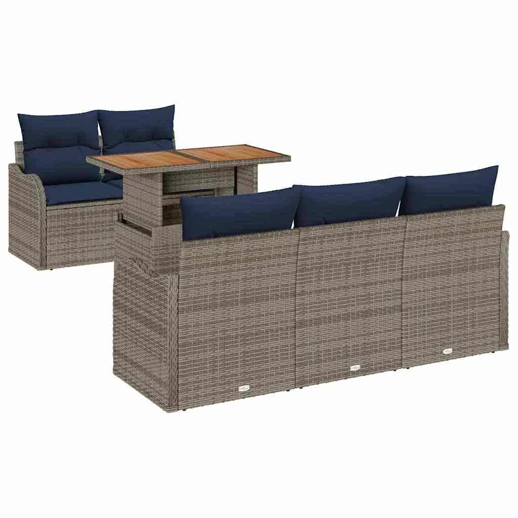 Outdoor-Rattansofa mit blauen Kissen und integriertem Holztisch