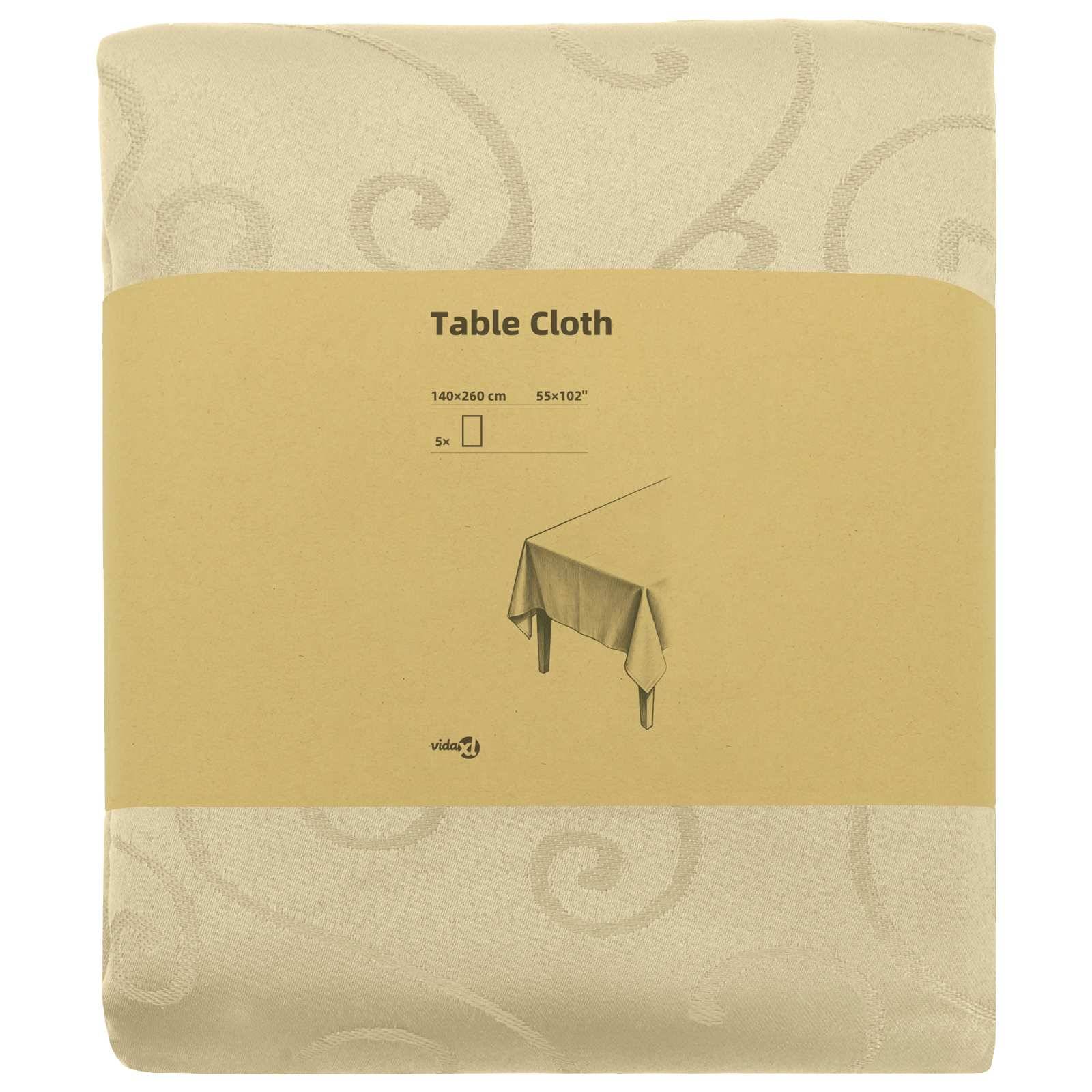 Verpackte beige Tischdecke mit Wirbelmuster und Etikett mit der Aufschrift „Table Cloth