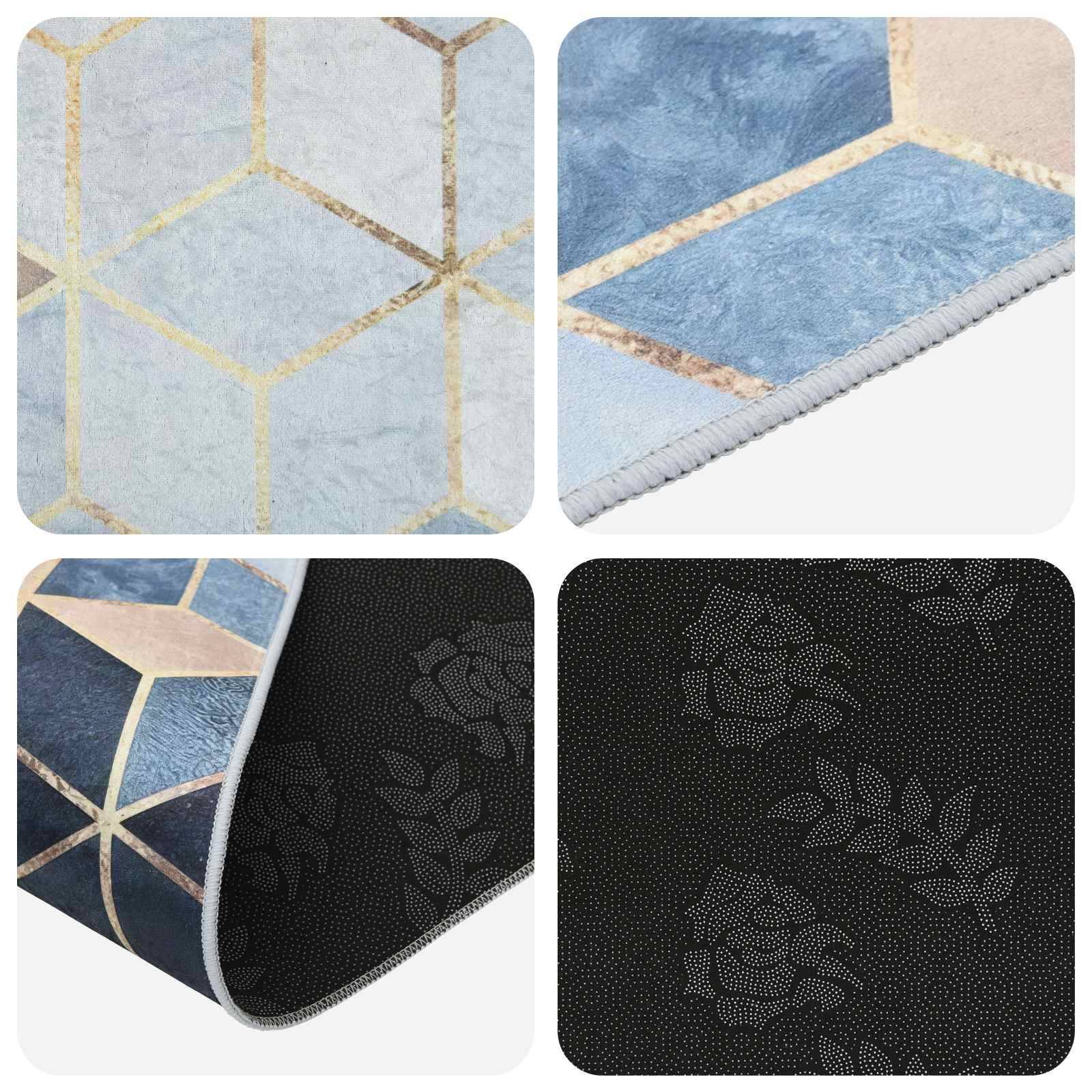 Nahaufnahme eines geometrisch gemusterten blau-goldenen Teppichs mit schwarzer floralem Unterseite und strukturierter Rückseite, gefaltet, um Design und Material hervorzuheben.