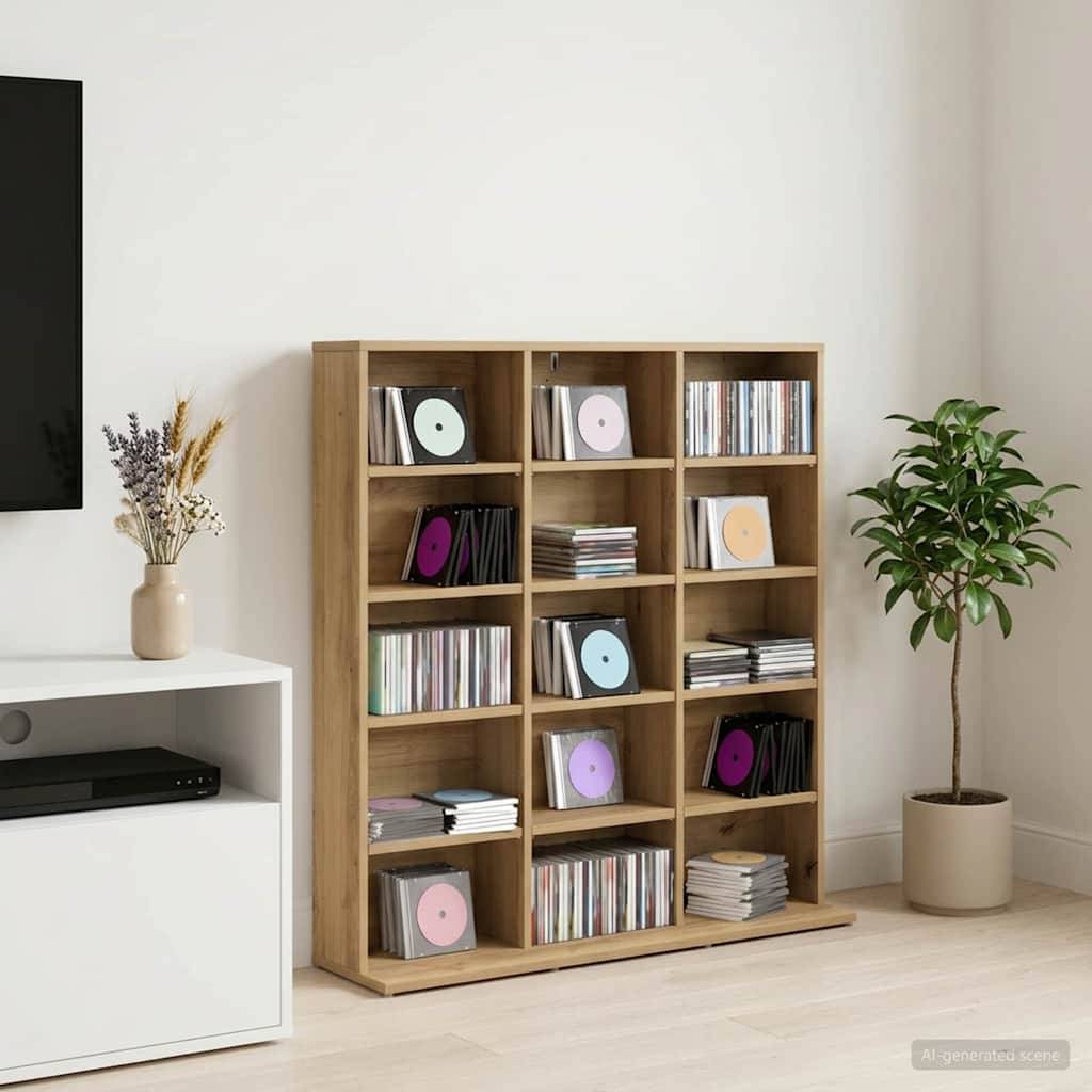 Holzregal gefüllt mit CDs und Schallplatten in einem minimalistischen Wohnzimmer, neben einer Topfpflanze und einem weißen Medienschrank.