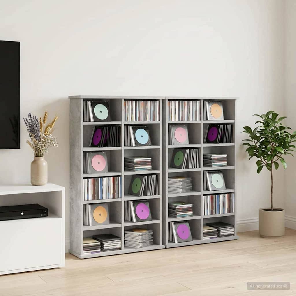 Graues Regalsystem gefüllt mit Schallplatten und CDs, gezeigt in einem minimalistischen Wohnzimmer neben einem Fernseherständer und Topfpflanzen.