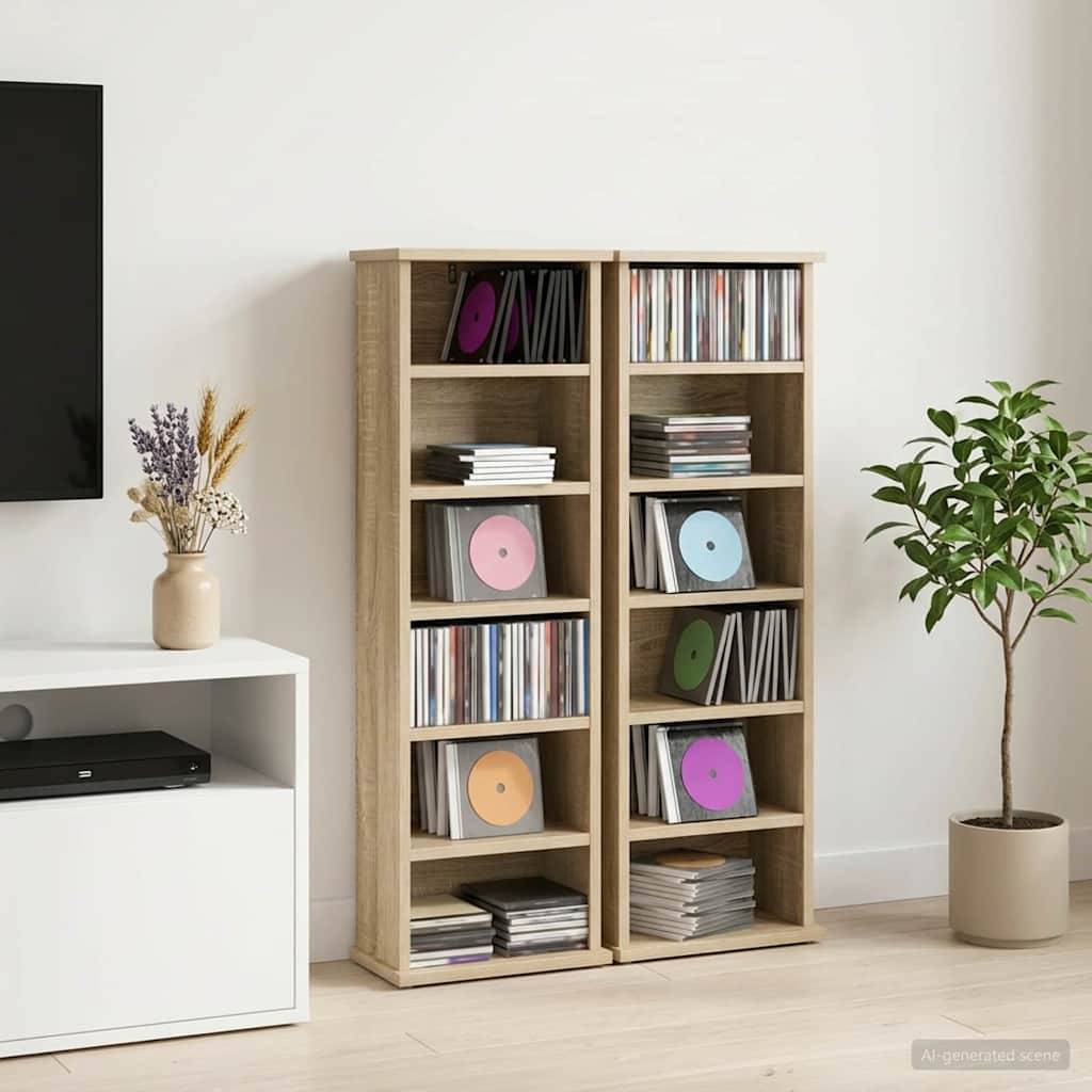 Zwei hohe Holzregale gefüllt mit Schallplatten und CDs in einem minimalistischen Wohnzimmer, mit einem Fernsehschrank auf der linken Seite und einer Topfpflanze auf der rechten Seite.