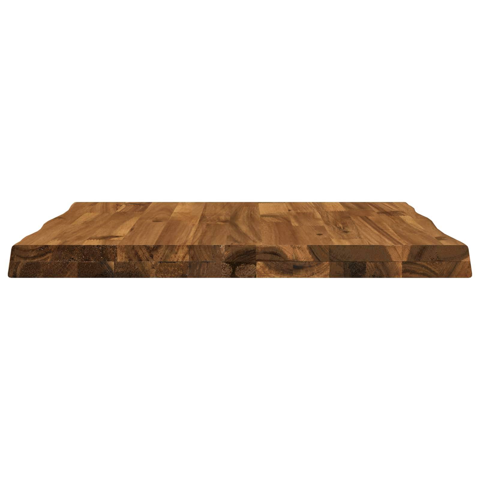 Rechteckiges Holzschneidebrett mit abgerundeten Ecken und einer dicken Metzger-Block-Stil-Kante auf weißem Hintergrund.