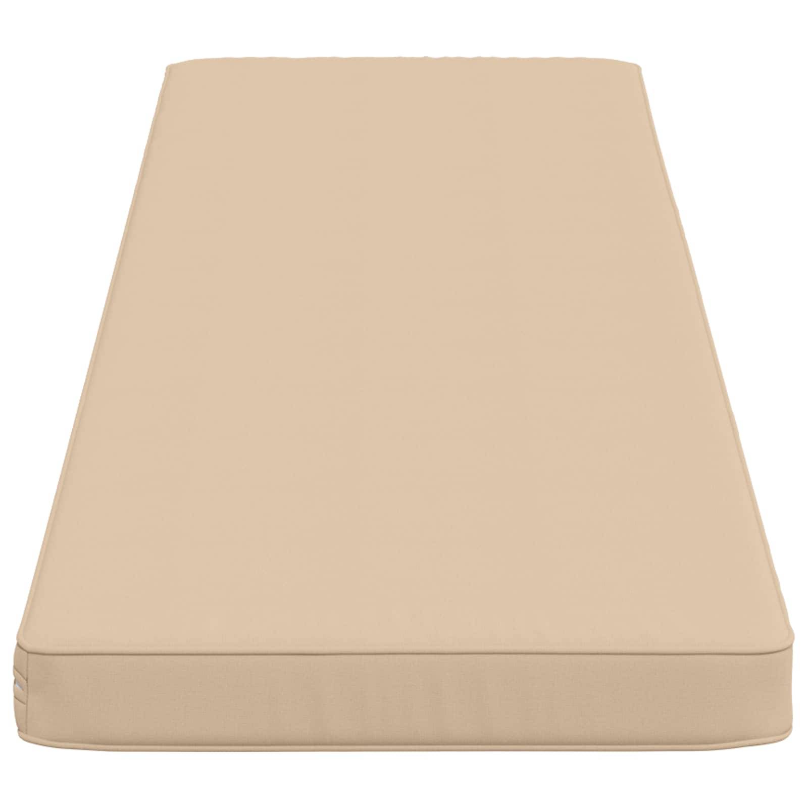 Beige rechteckiges Kissen oder Matratzenauflage, von oben auf weißem Hintergrund dargestellt.