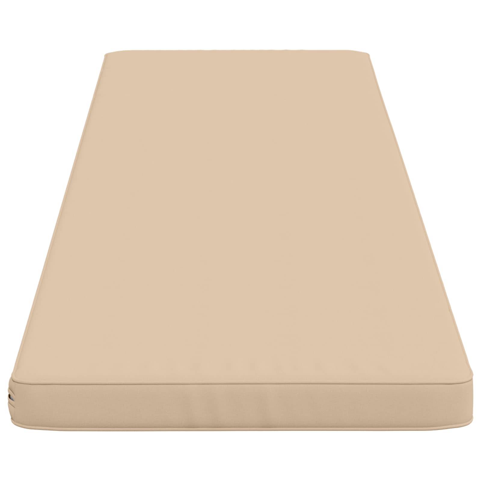 Beige rechteckiges Kissen oder Matratzenauflage, von oben auf weißem Hintergrund gezeigt.