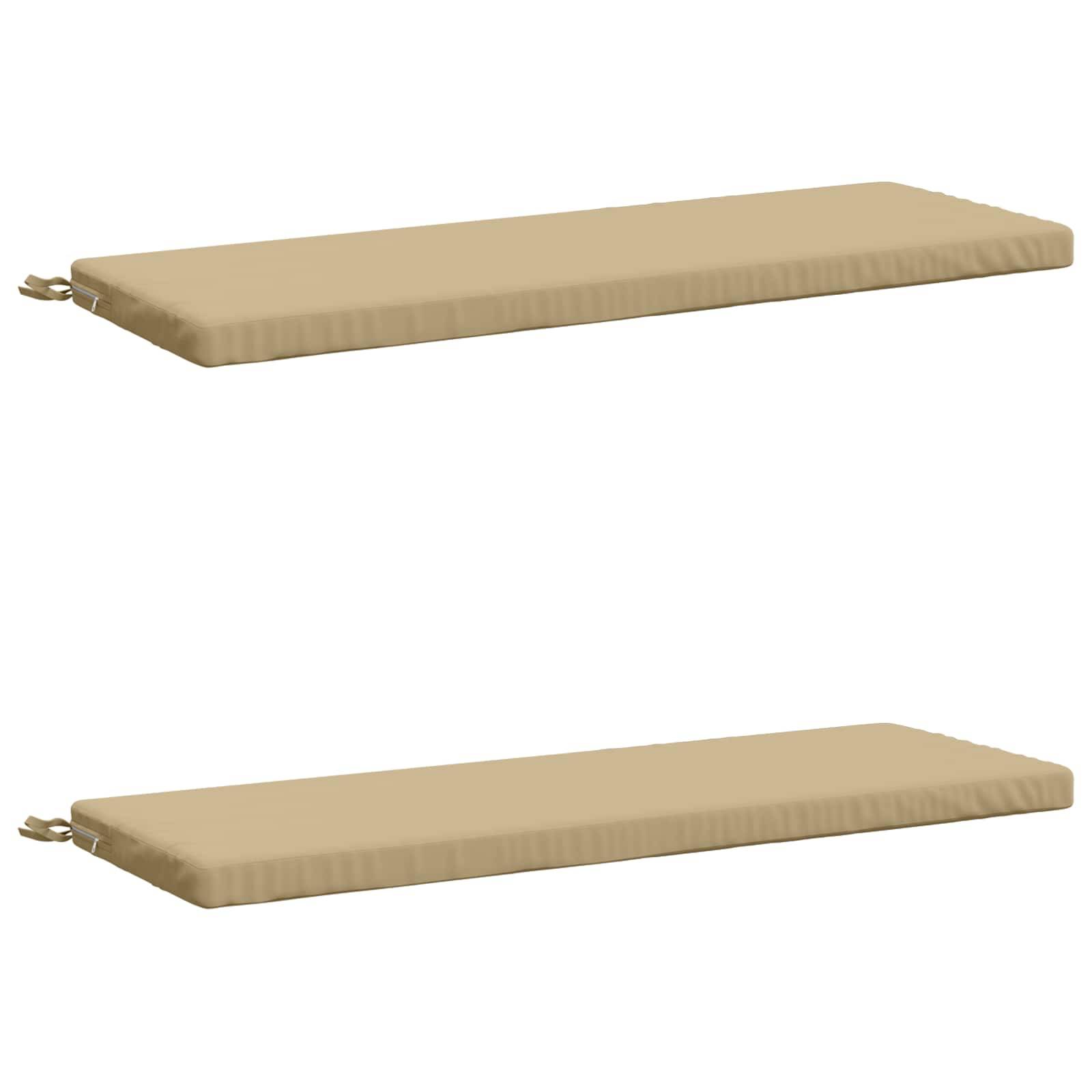 Zwei beige rechteckige gepolsterte Matten auf weißem Hintergrund, jede mit einem kleinen Riemen an einem Ende.