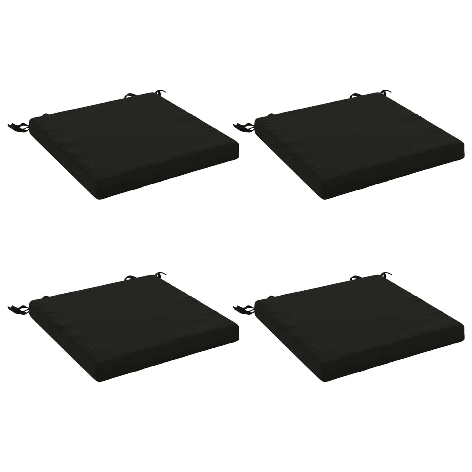 Vier schwarze quadratische Sitzkissen mit Eckbändern, auf weißem Hintergrund abgebildet.