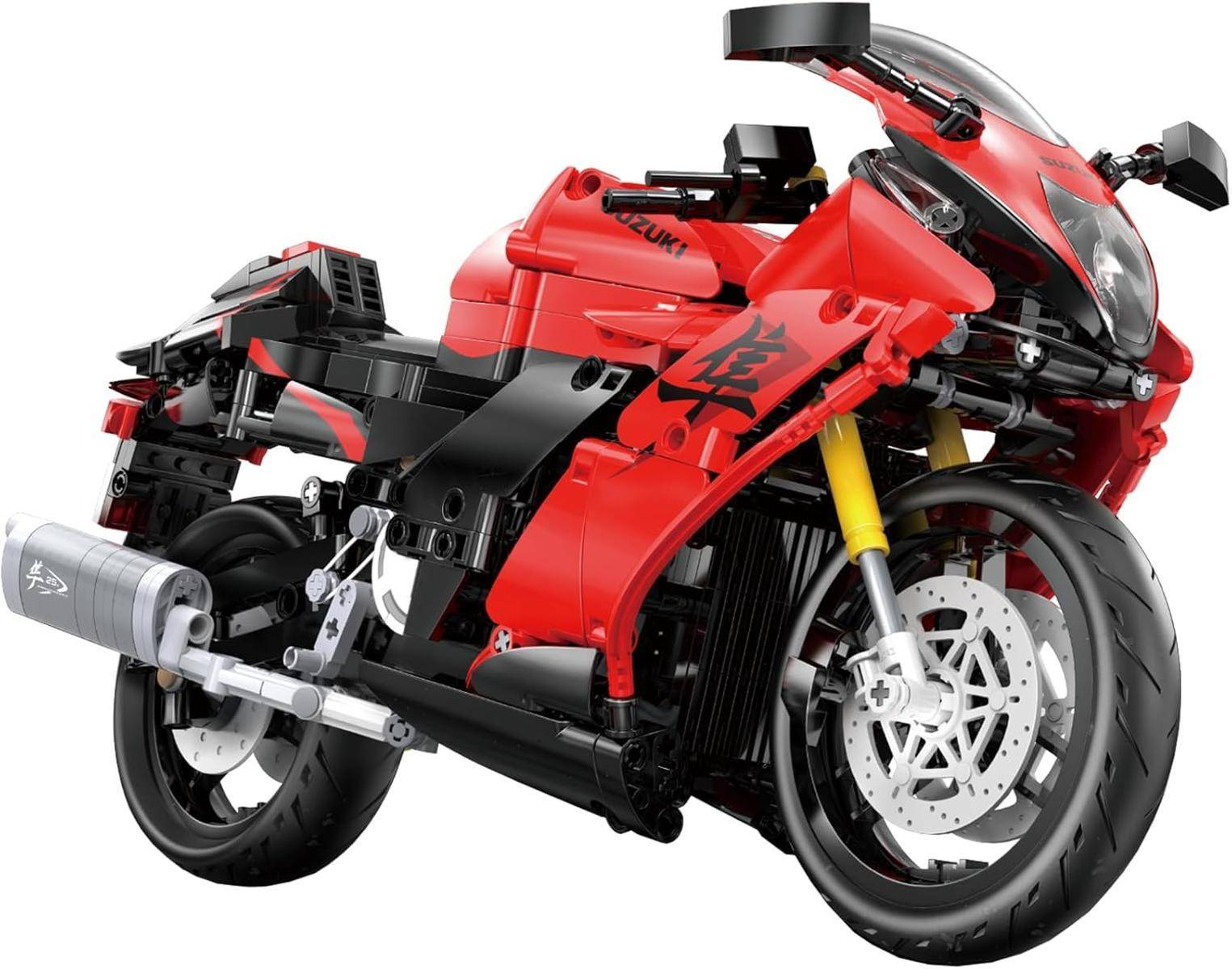Rot-schwarzes Sportmotorrad in Dreiviertel-Frontansicht vor weißem Hintergrund, wobei das Vorderrad, die Scheibenbremse und die aerodynamische Verkleidung hervorgehoben werden.