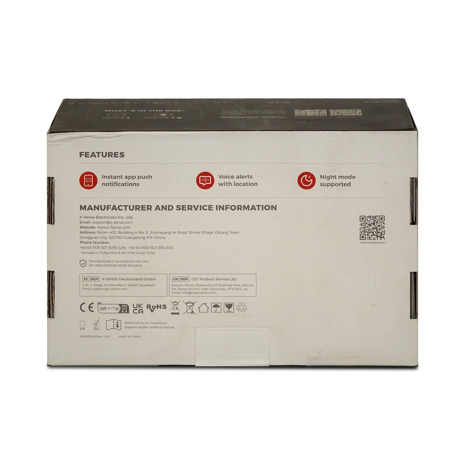 Rückseite einer Produktverpackung mit Funktionsliste: Sofortige App-Push-Benachrichtigungen, Sprachmeldungen mit Standort und Nachtmodus unterstützt, plus Hersteller-/Serviceinformationen und QR-Code.