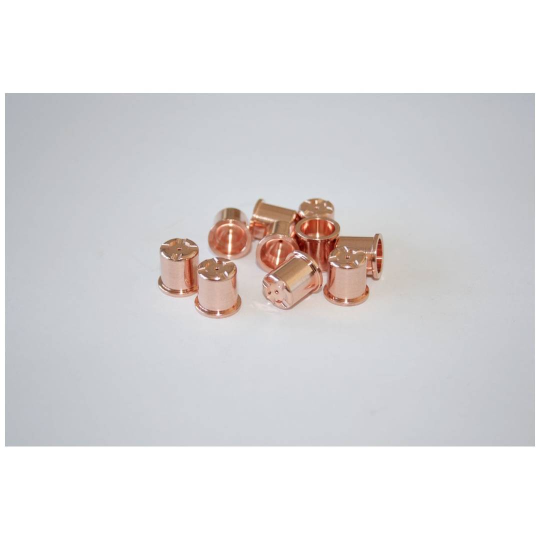 Kleine Ansammlung von glänzenden, kupferfarbenen zylindrischen Metallbefestigungselementen oder Kappen auf einer weißen Oberfläche.