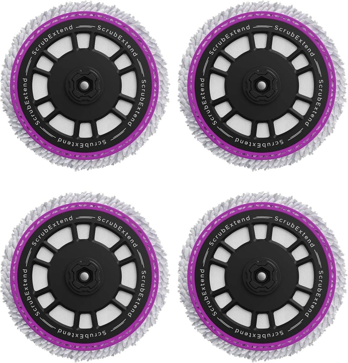 Vier runde ScrubExtend-Ersatz-Schrubberköpfe mit schwarzen Mittelpunkten, violetten Ringen und weißen Borsten, in einem 2x2-Raster dargestellt.