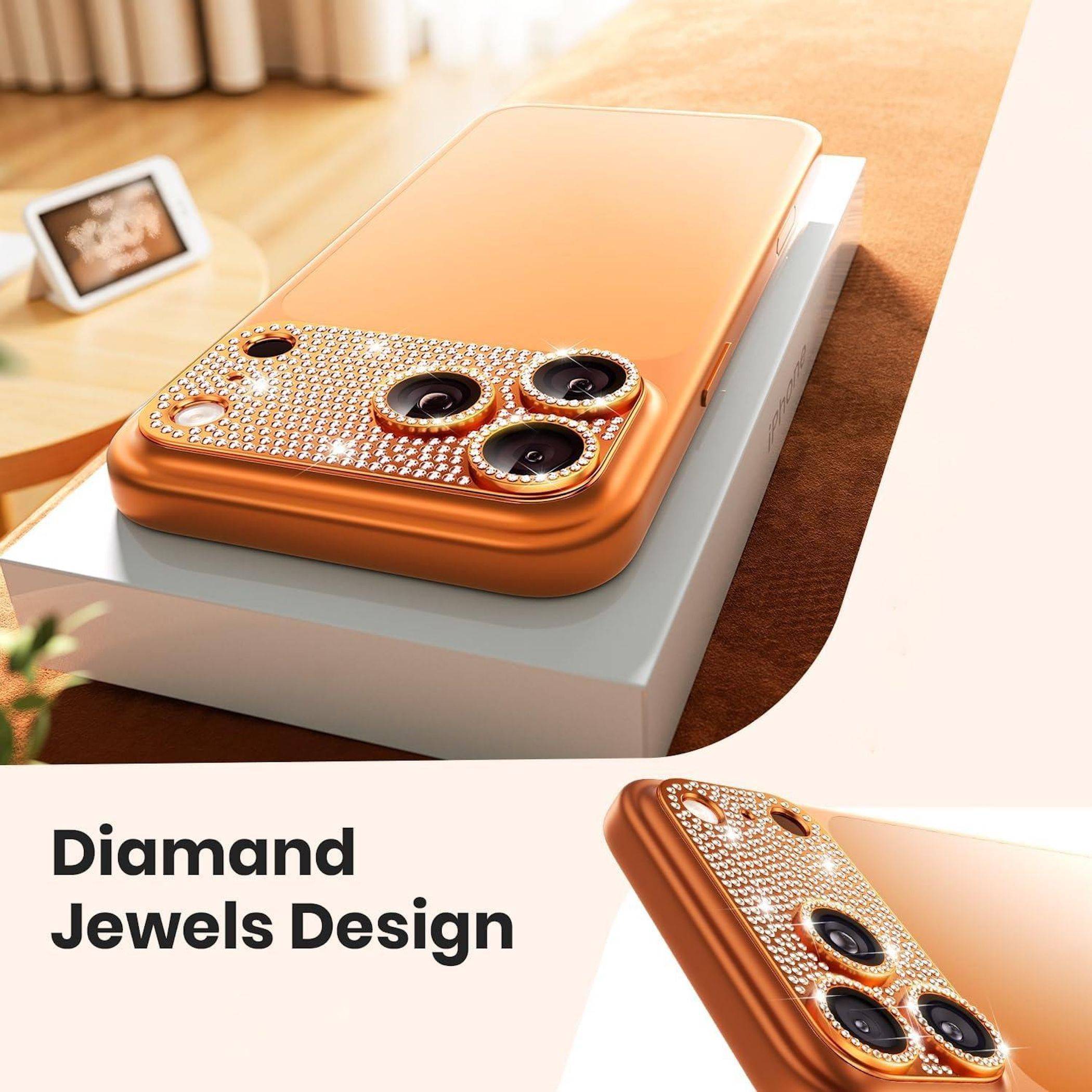 Oranges Smartphone mit diamantbesetztem Kamerabereich auf einer weißen Box, gezeigt als Produktanzeige 