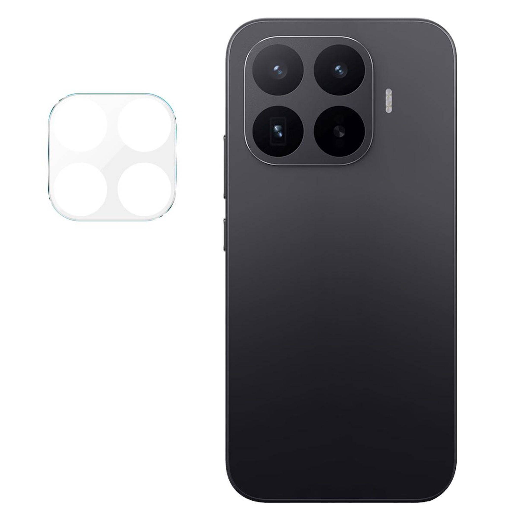 Schwarzes Smartphone, von hinten gezeigt, mit einem quadratischen Vier-Kamera-Modul; daneben befindet sich ein kleines weißes Zubehör mit abgerundeten Ecken.