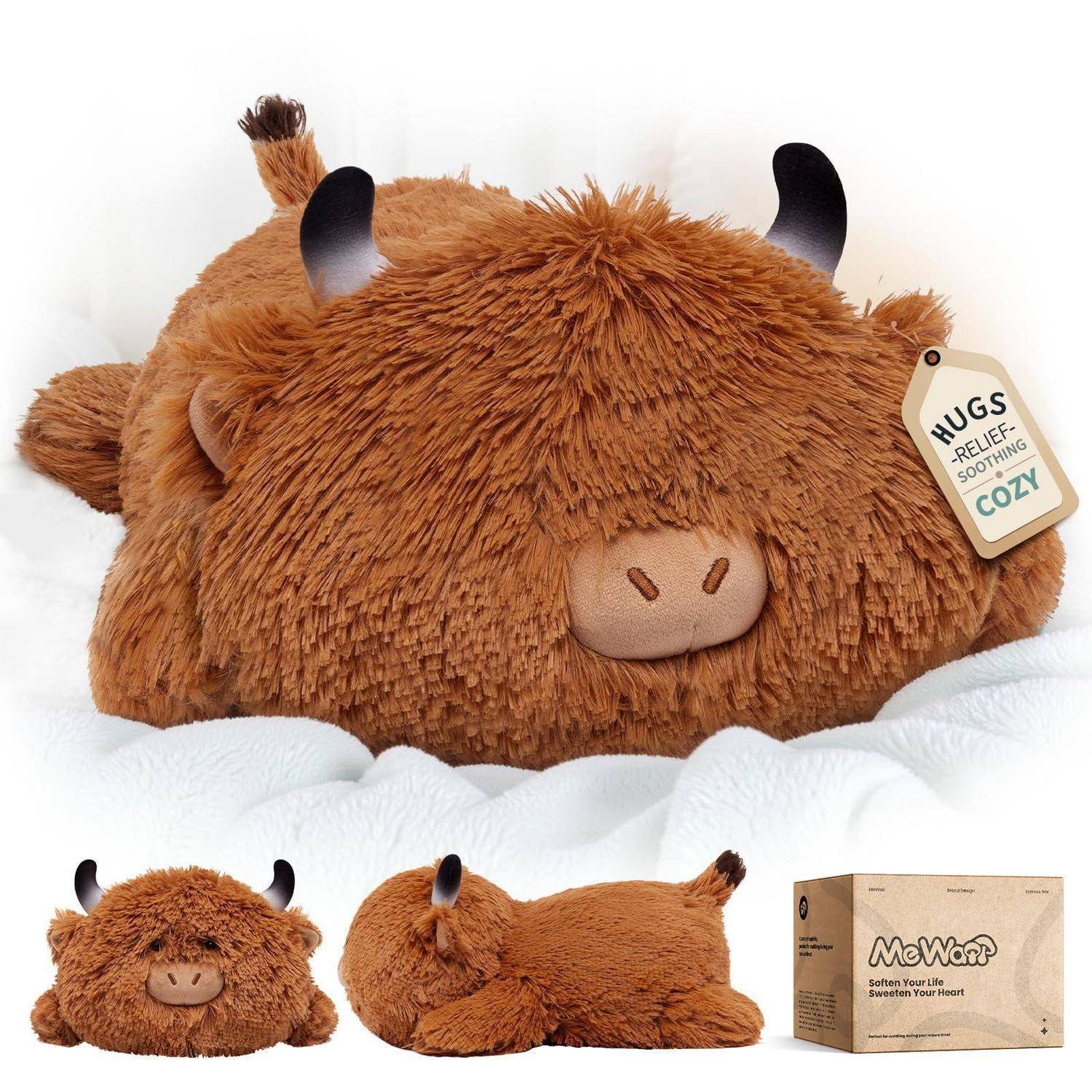 Braune Plüsch-Kuhform-Körperkissenbezug mit schwarzen Hörnern und 'HUGS RELIEF SOOTHING COZY'-Etikett, gezeigt von vorne und von der Seite mit Produktkarton.