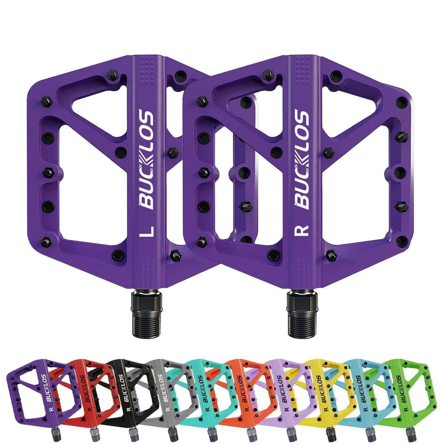 Purple Bucklos Fahrradpedale in Frontal- und Schrägansicht mit einer Reihe von Farboptionen darunter auf weißem Hintergrund.