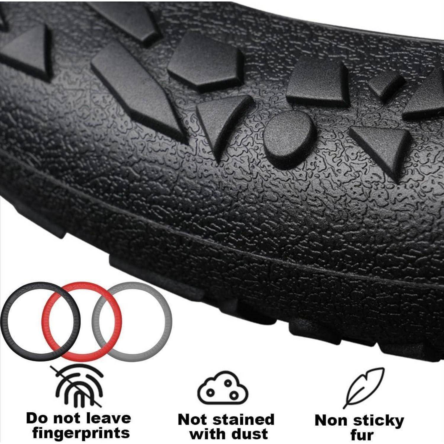 Nahaufnahme einer schwarzen strukturierten Schuhsohle mit Griffmuster, plus Symbole mit der Aufschrift: Keine Fingerabdrücke hinterlassen, Nicht fleckenbildend, Nicht klebrig.