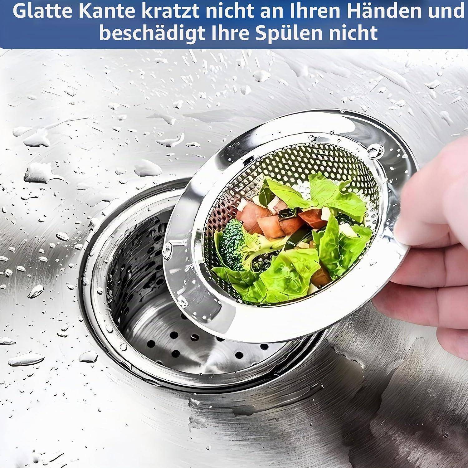 Hand entfernt ein Edelstahl-Spülensieb gefüllt mit Speiseresten; deutscher Text besagt, dass die glatte Kante Hände nicht zerkratzt und Spülen nicht beschädigt.