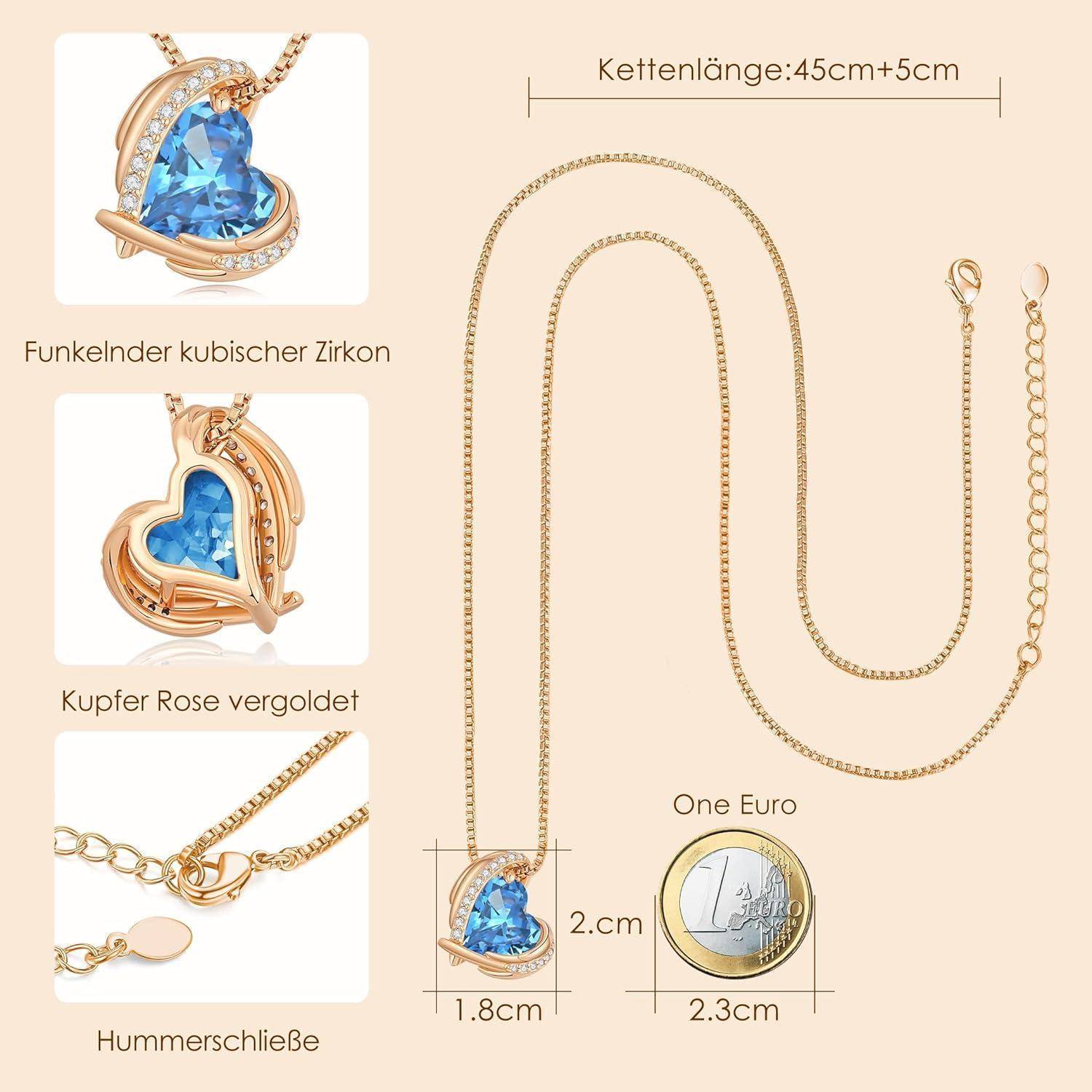 Goldhalskette mit blauem Herzanhänger, gezeigt mit Größenangaben: Kettenlänge 45+5 cm, Anhänger 2,2 cm, Hummerkrallenver­schluss und Nahaufnahmen der Zirkoneinung und Roségoldfinish.
