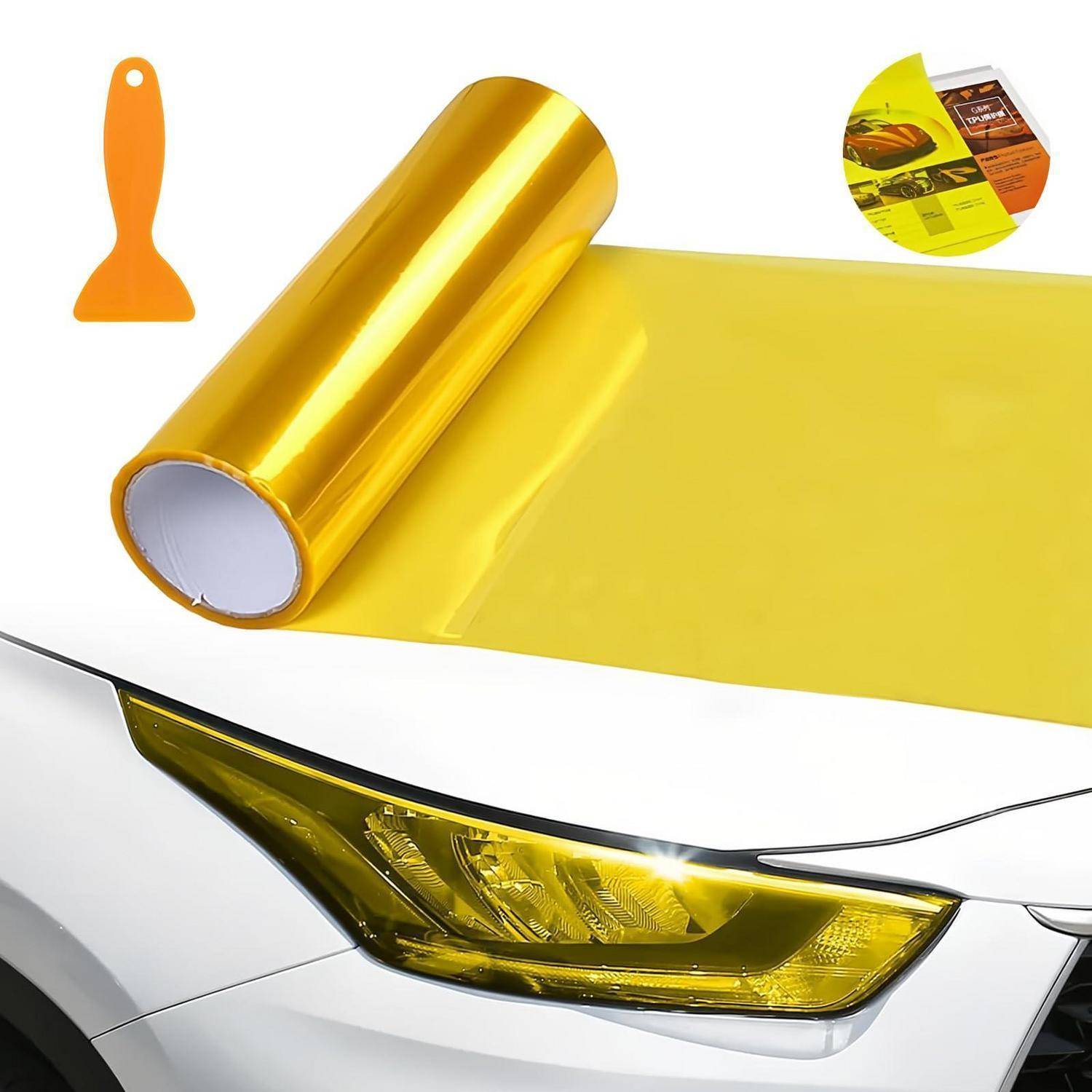 Gelbe reflektierende Tönungsfolie in Rollenform mit Rakel, wird auf ein Autofrontlicht aufgetragen.
