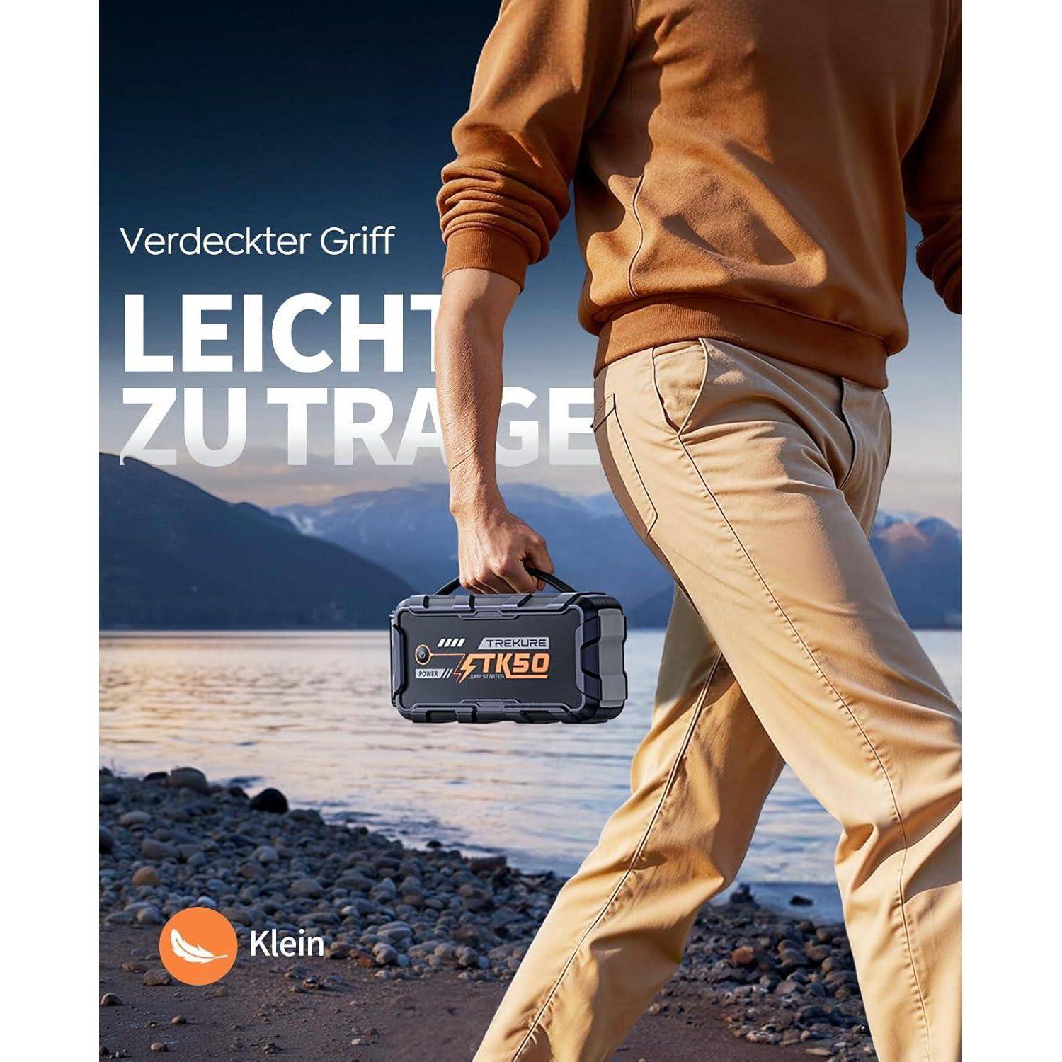 Ein Mann, der an einem See vorbeigeht und einen robusten schwarzen Koffer mit verborgenem Griff trägt; Der deutsche Text liest sich 