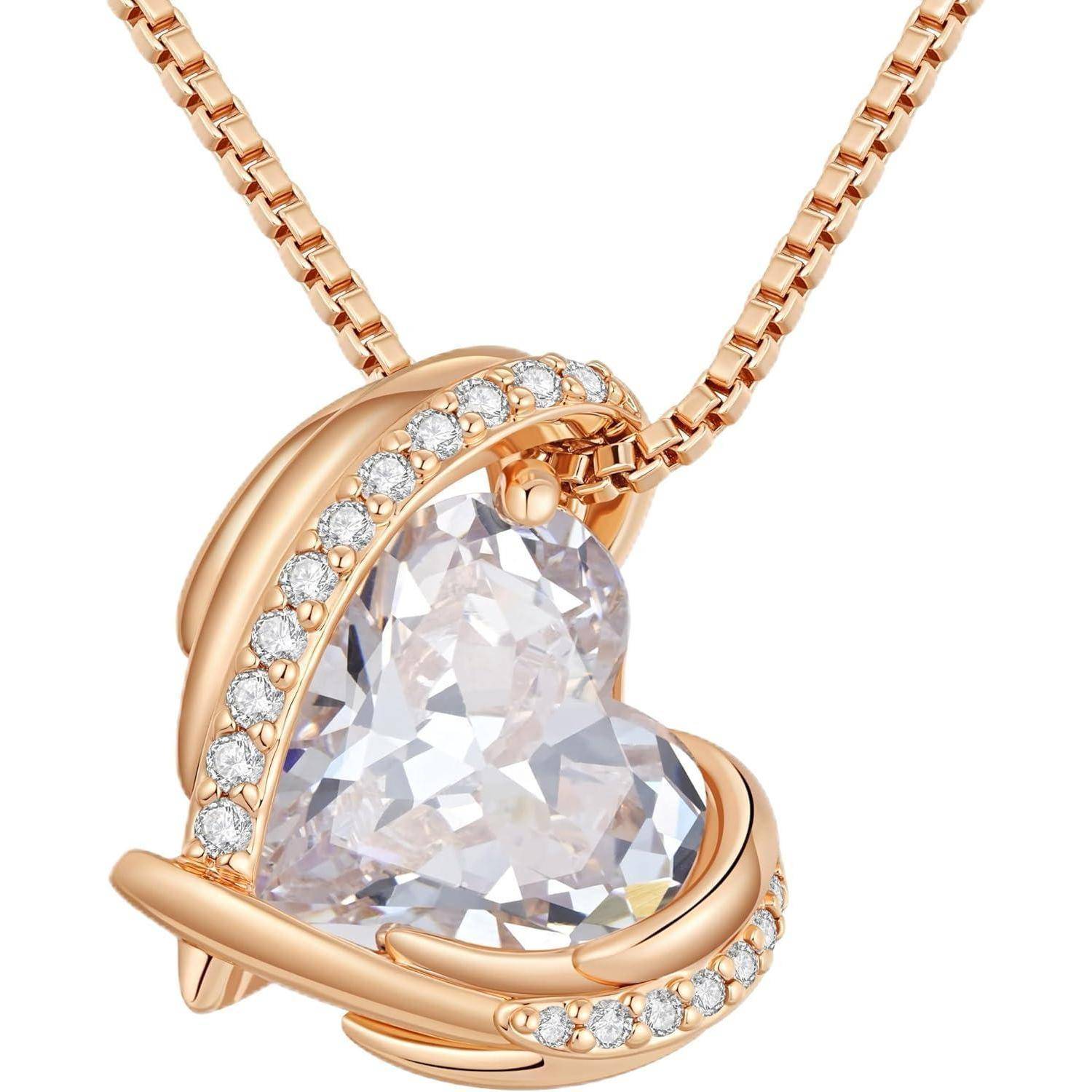 Rosegoldene Herzketten-Anhänger mit großem klarem facettiertem Edelstein und kleinen Pavé-Steinen auf der herzförmigen Fassung.