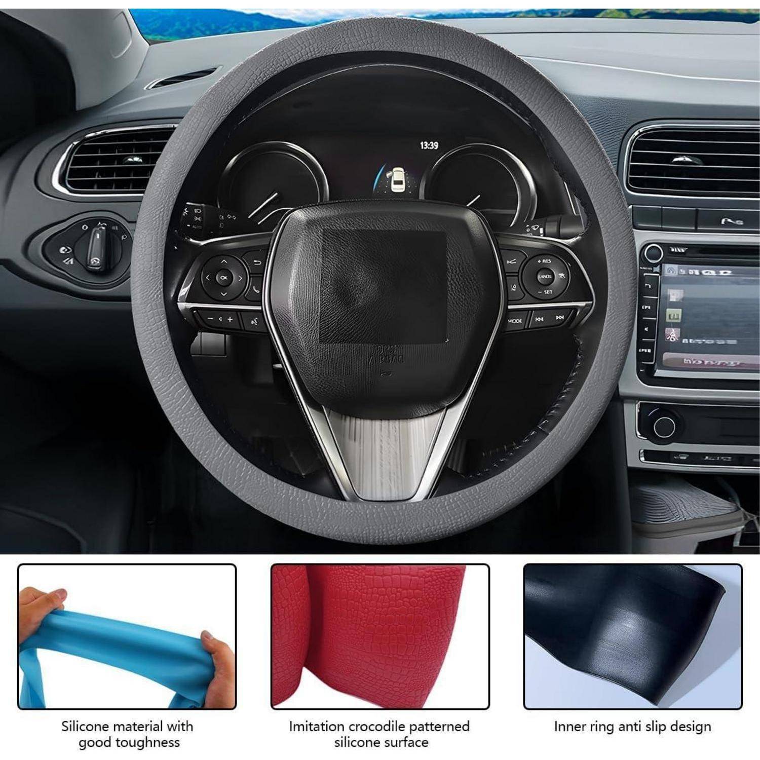Autolenkrad und Armaturenbrett mit einer dreiteiligen Anzeige darunter, die Silikonmaterial, Krokodilmuster und rutschfestes Design am inneren Ring zeigt.