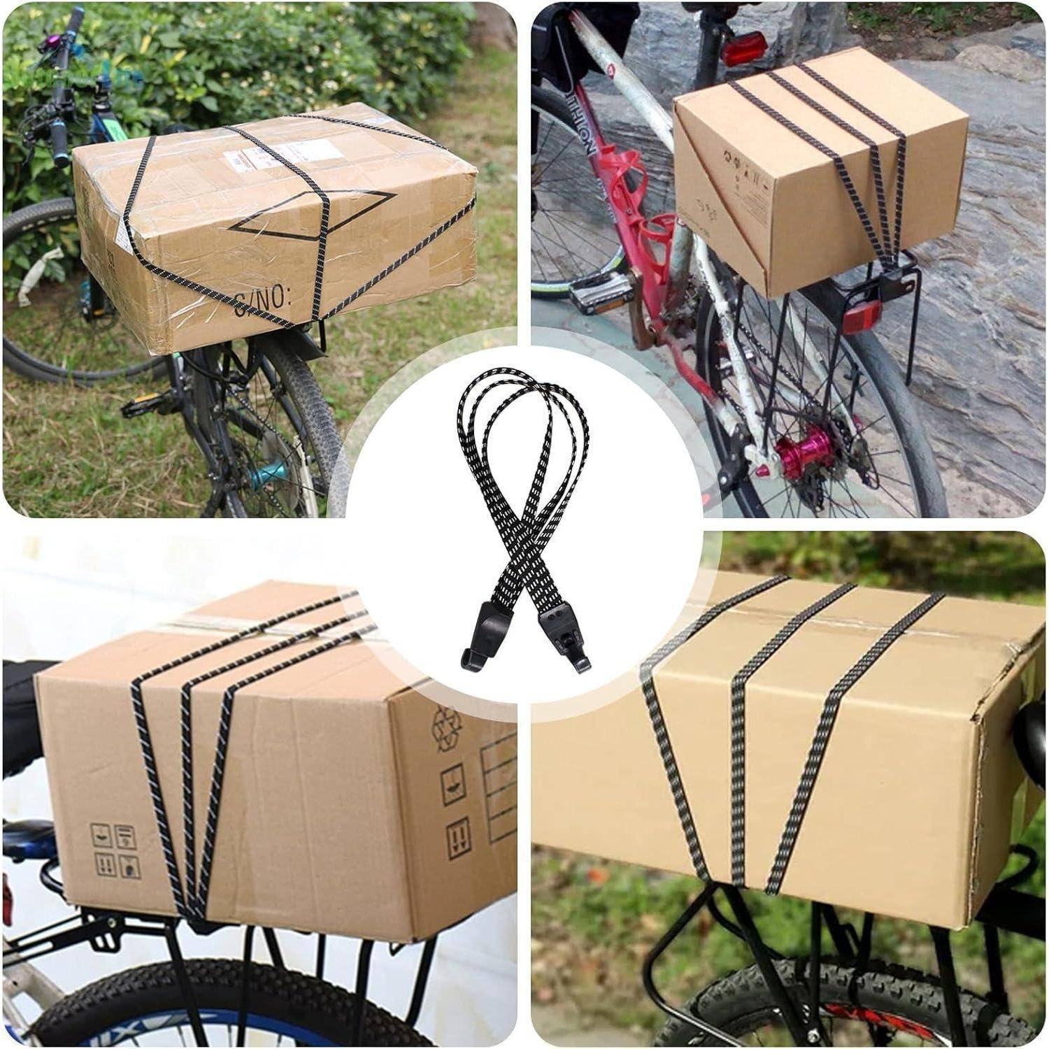 Fahrradträger-Ladung mit Pappkarton und schwarzen Spannriemen gesichert, dargestellt in vier Beispielen, wobei das Riemenprodukt zentriert ist.