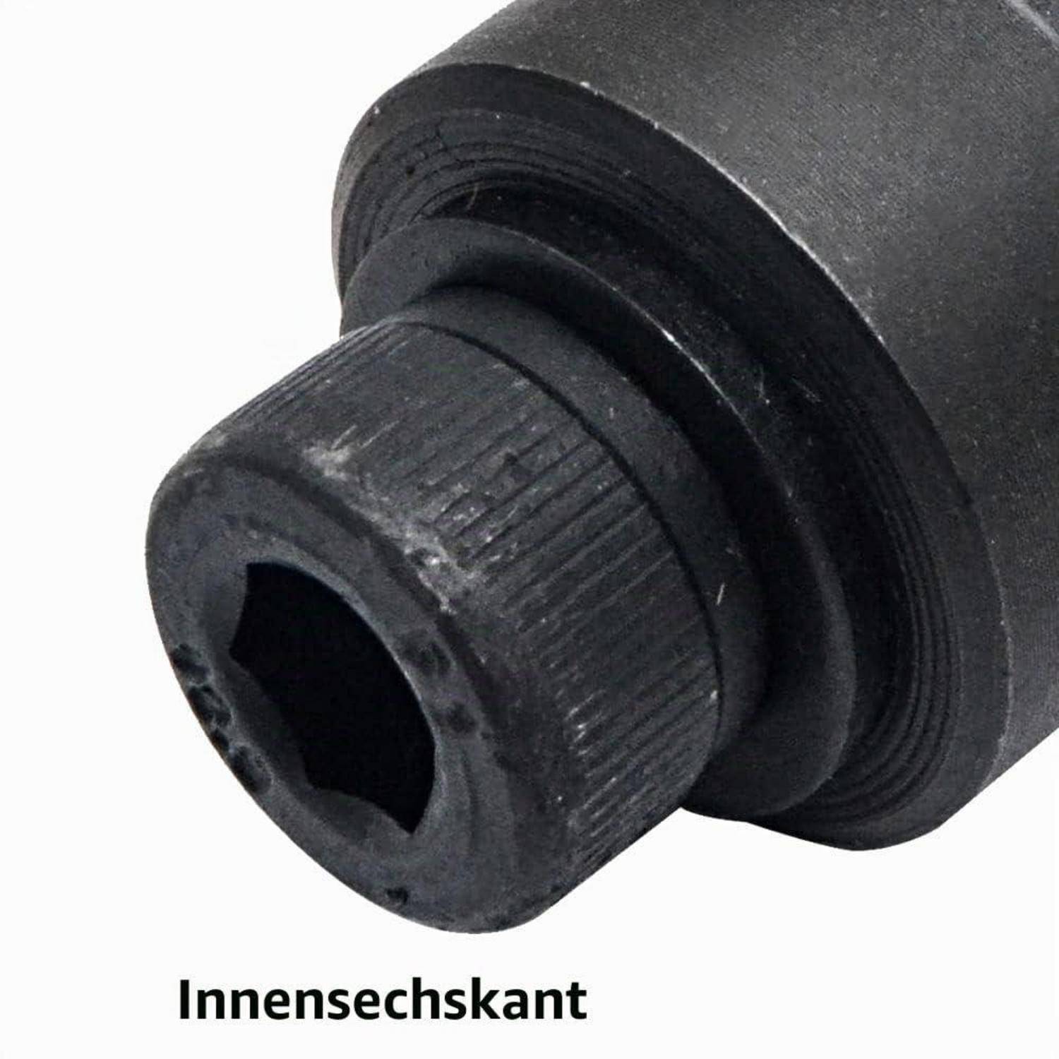 Nahaufnahme eines schwarzen Innensechskant-Schraubenkopfes mit der deutschen Bezeichnung 'Innensechskant' darunter.
