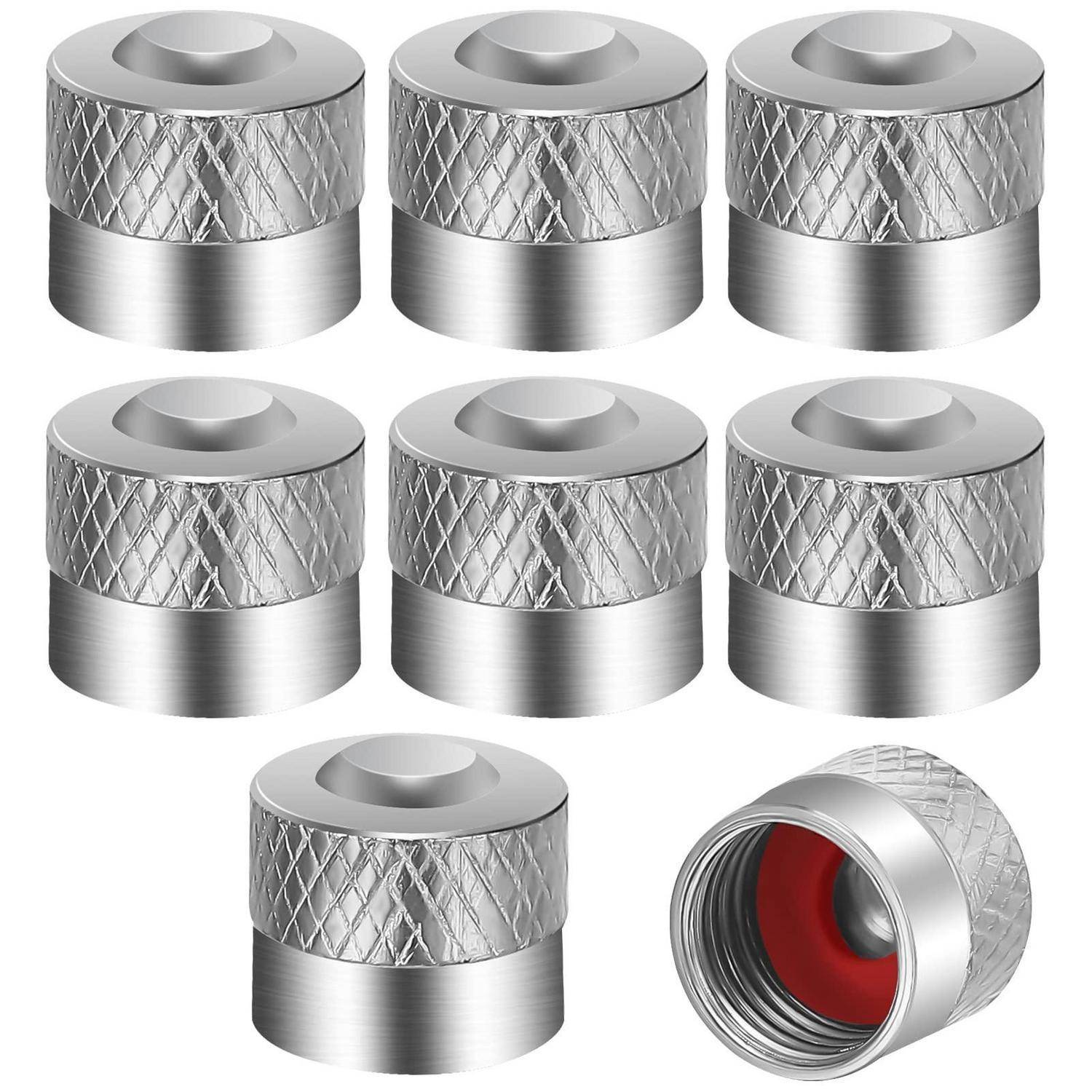 Acht silberne Metallzylinderstecker oder Kappen mit Rautenstreifenmuster, gezeigt in einem produktgerechten Layout auf weißem Hintergrund.