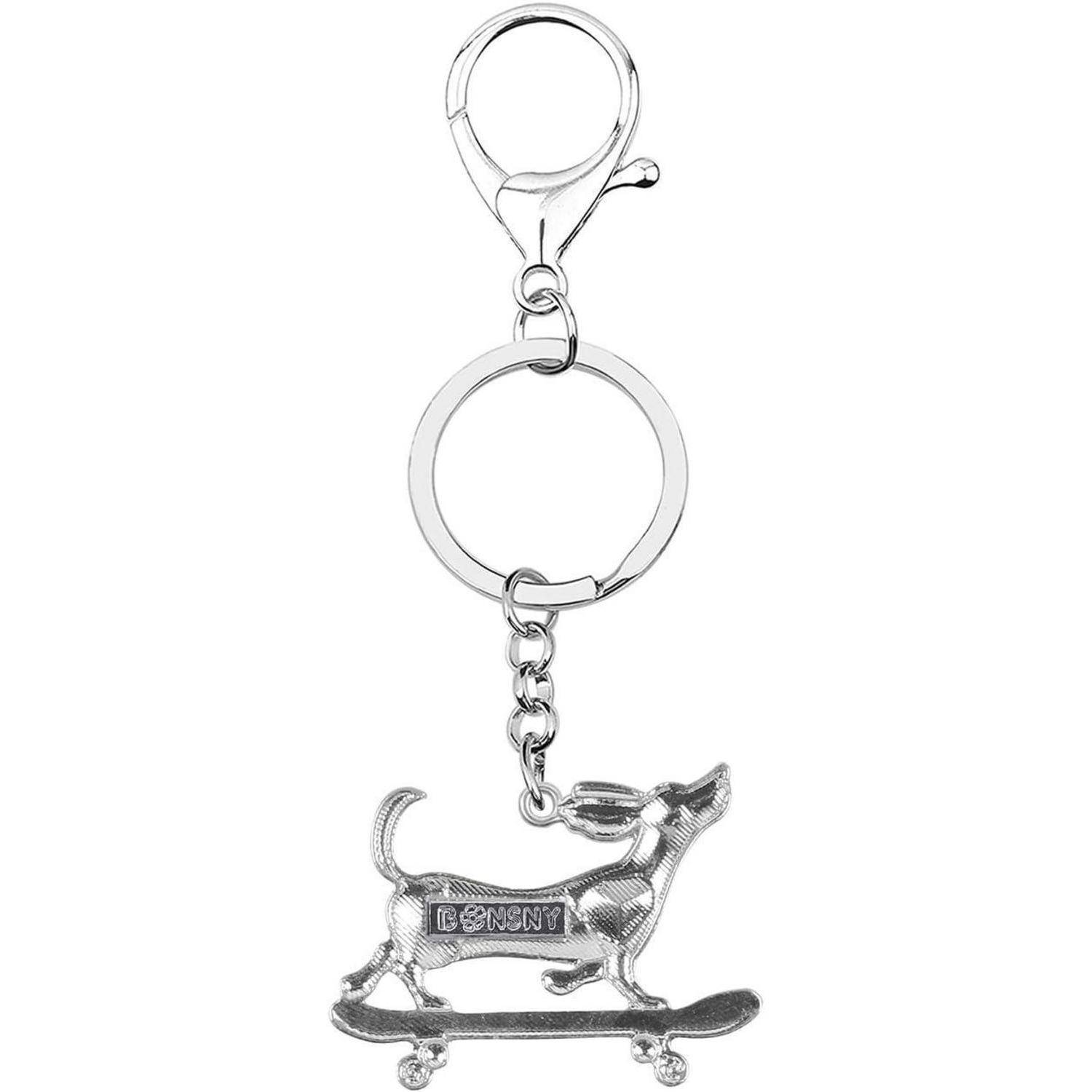 Silberner Schlüsselanhänger mit Hummerklaue, rundem Ring und hängendem hundeförmigem Skateboard-Charm.