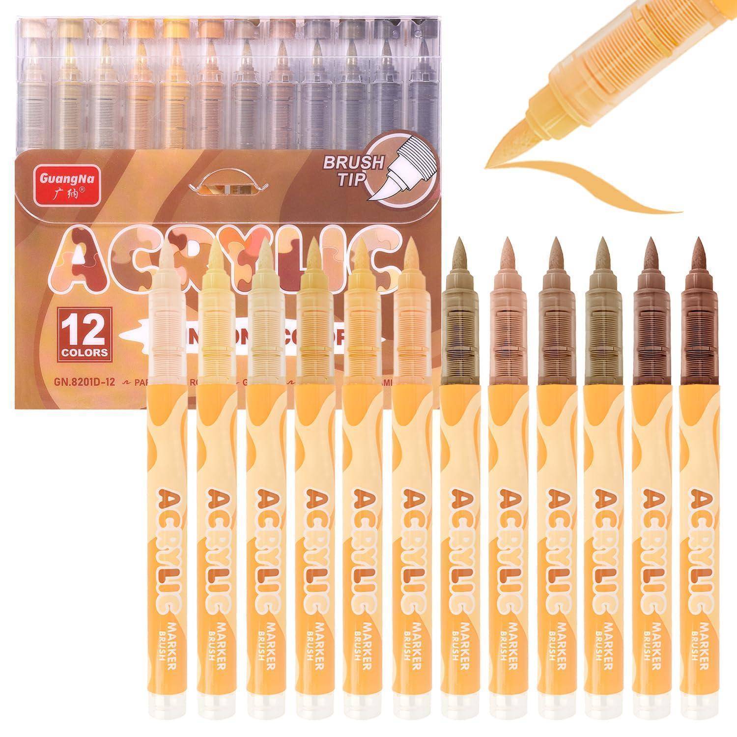 Packung mit 12 orangefarbenen Acrylfarbmarkern mit Pinselspitze in verschiedenen Farben, abgebildet mit ihrer Schachtelverpackung und einem Beispiel-Pinselstrich.
