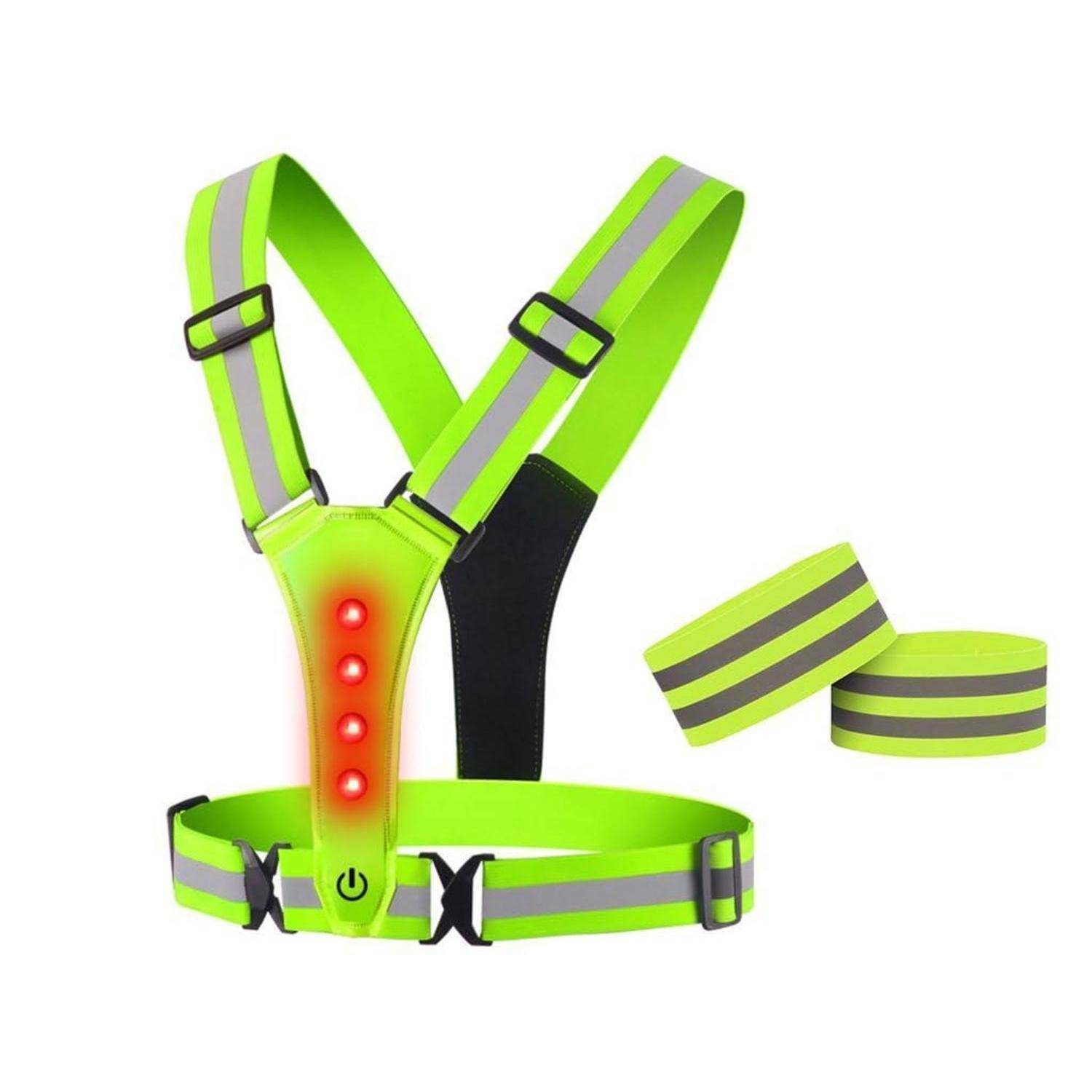 Neongrünes reflektierendes LED-Sicherheitsgeschirr mit verstellbaren Riemen, vorderer Einschalttaste und passenden Armbändern auf weißem Hintergrund.