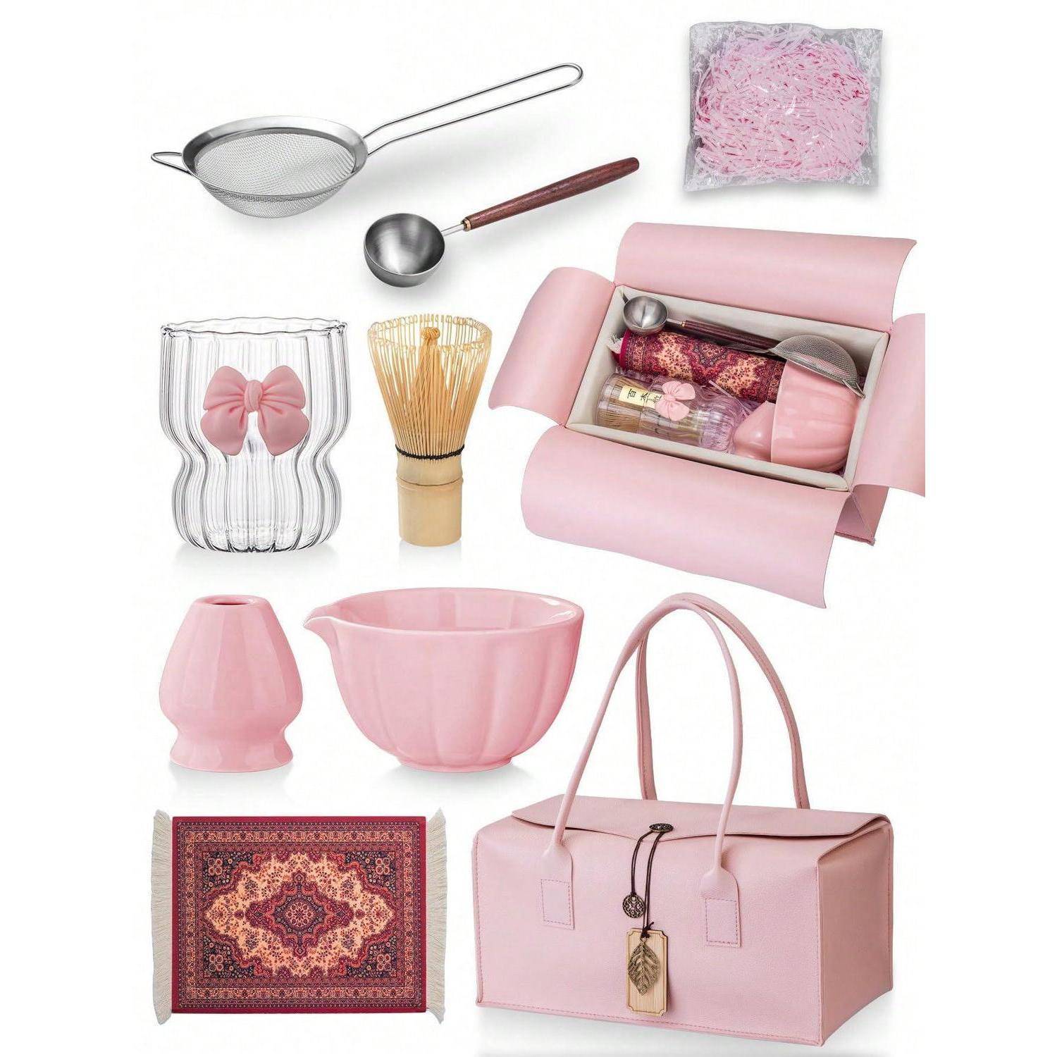 Rosafarbenes Teegeschenk-Set mit Zubehör: Sieb, Schöpflöffel, Teefilter, Tasse, Schneebesen, Schale, Verpackungsbox, Tablett und Tragetasche.