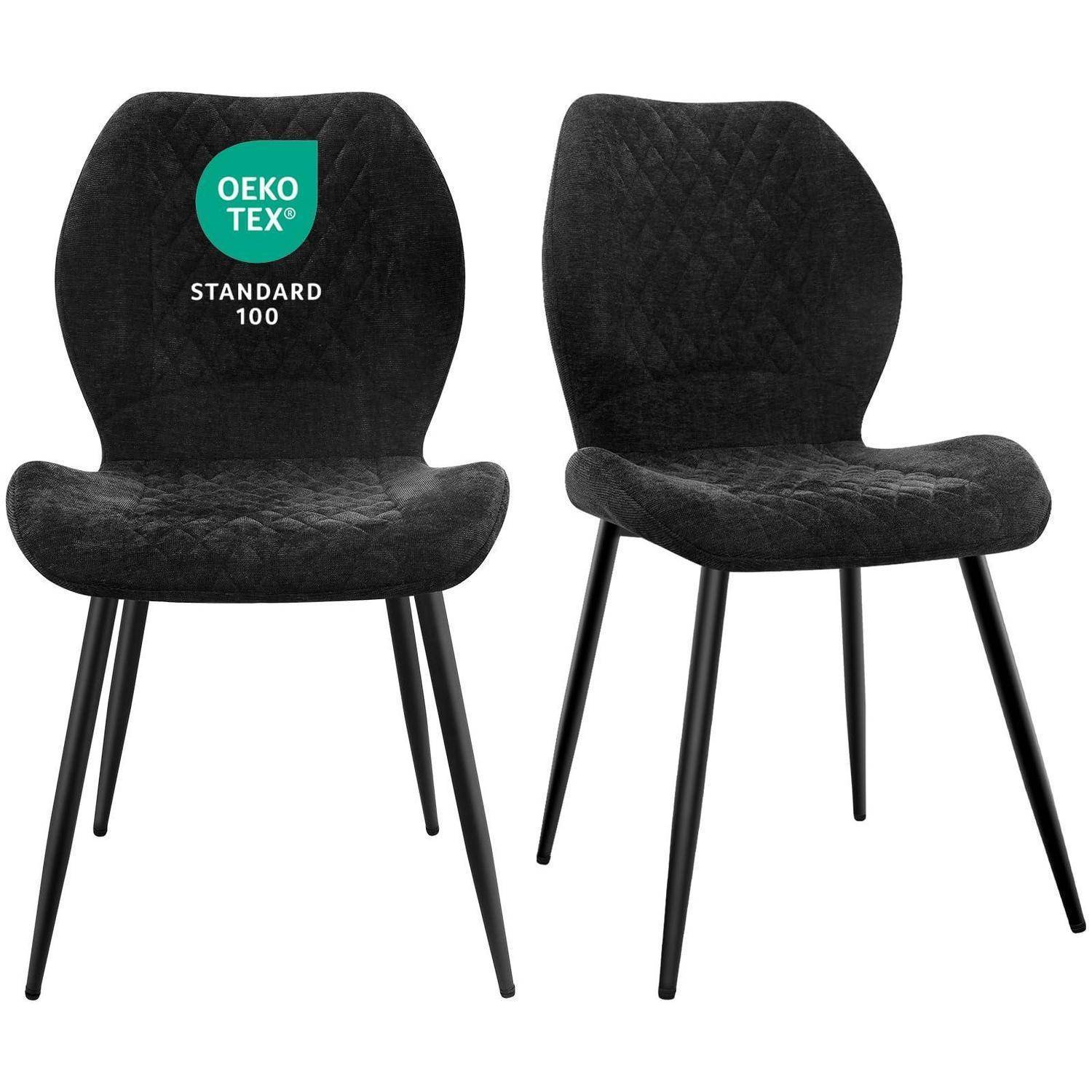 Zwei schwarz gepolsterte Esszimmerstühle mit gesteppten Rückenlehnen und sich verjüngenden Beinen, in Frontal- und Schrägansichten auf weißem Hintergrund gezeigt; einer trägt ein OEKO-TEX Standard 100 Zertifikat.