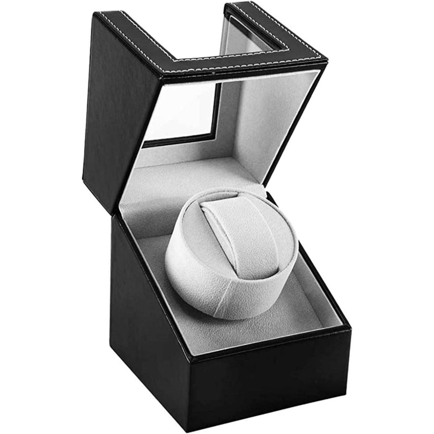 Schwarze Präsentationsbox mit weißem Futter, offen zur Anzeige eines weißen gepolsterten Uhrenkelches im Inneren.